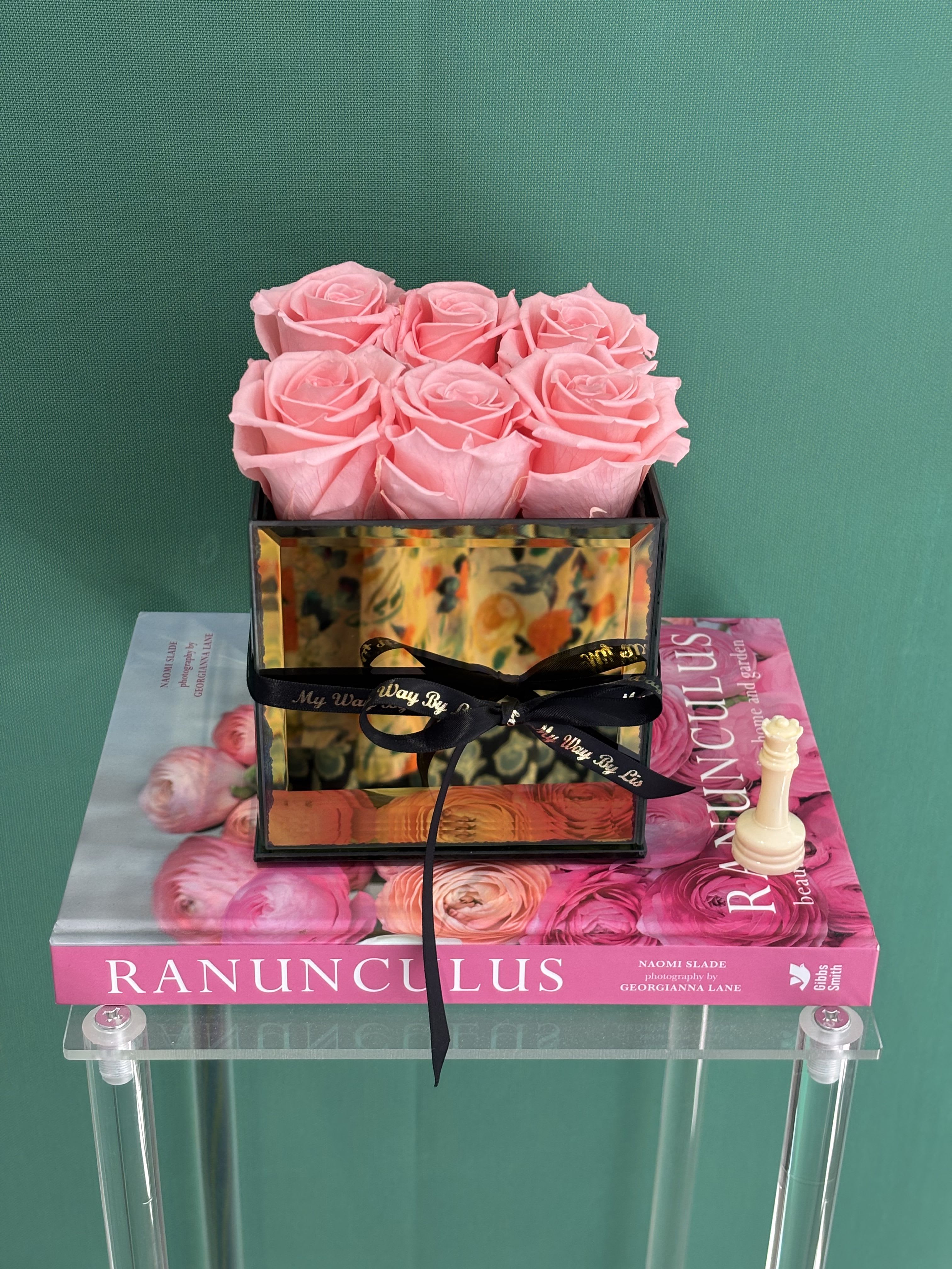 Miami Vibes. (PRESERVED ROSES) - Everlasting preserved roses, touch of nature’s elegance, beauty low maintenance.  Preserved roses are real roses that have been specially treated to maintain their fresh look and softness for years — without needing water or sunlight.  Here’s how it works: • The roses are picked at their most beautiful stage. • The natural sap and moisture are replaced with a preserving solution, usually made of glycerin and natural oils. • This process keeps the petals soft and vibrant, almost as if the rose were freshly cut.