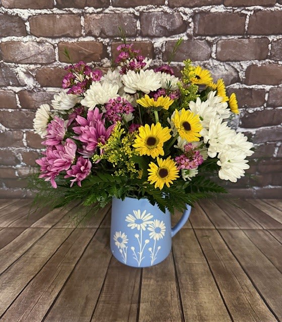 Daisy Delight - A cute periwinkle colored vase with white daisies.  And best of all filled with an array of daisies. Approx.  14" W x 15" H
