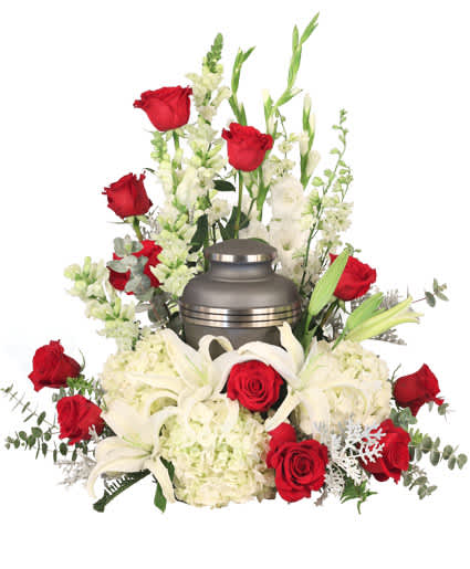 MISSING YOU URN CREMATION FLOWERS  - Honor and celebrate the fruitful life of a lost loved one with an arrangement that truly encompasses their elegance. The Missing You cremation arrangement is a luxurious addition to any memorial service. Encompassing the urn of your choice, this arrangement features majestic white hydrangeas that will ease the minds and comfort the souls that are grieving with contrasting red roses to represent the vibrance of their life. Urn Not Included 