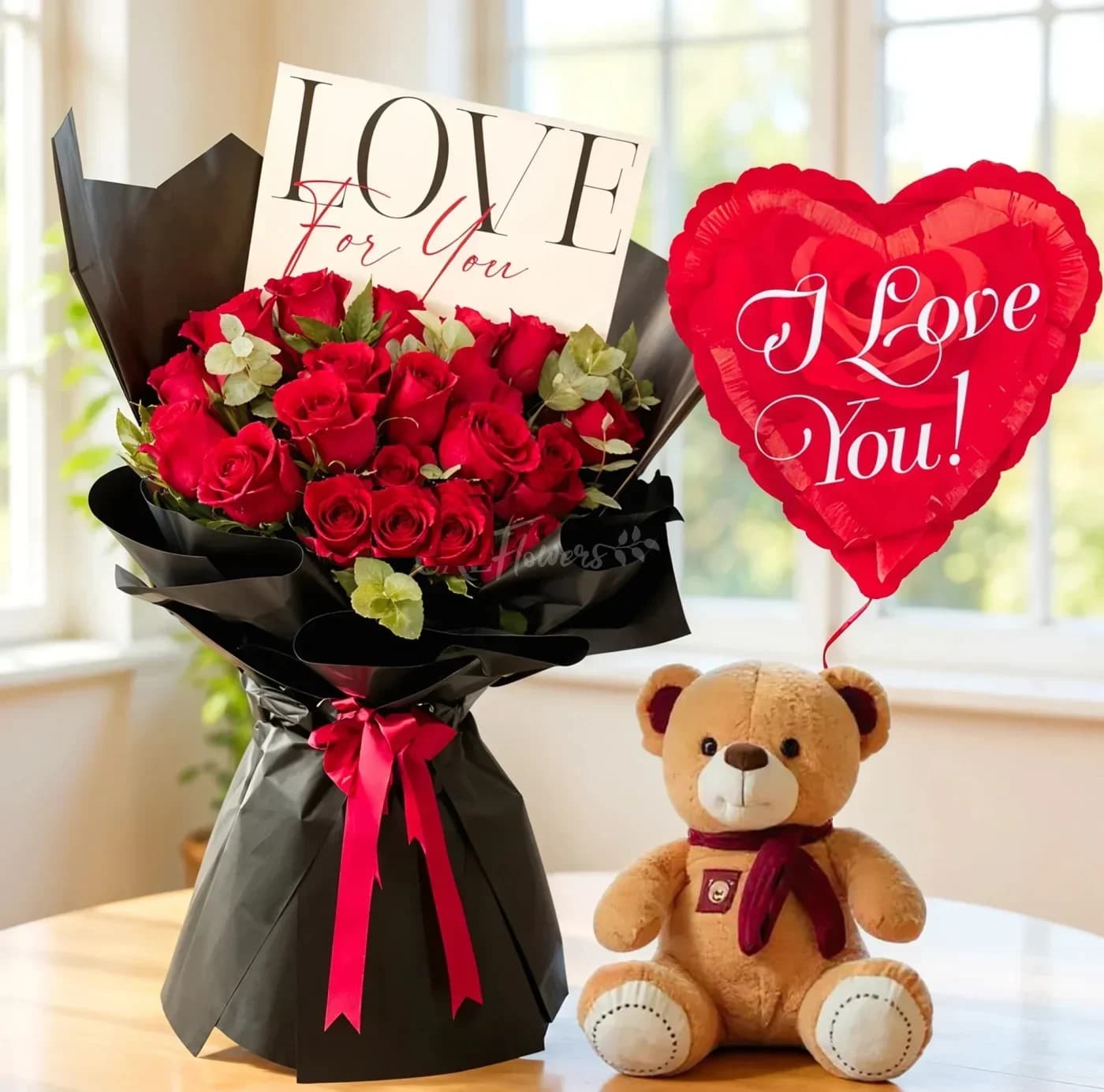 Bouquet of red roses with a teddy bear and heart balloon
