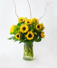 Sunflower bouquet in a clear glass vase