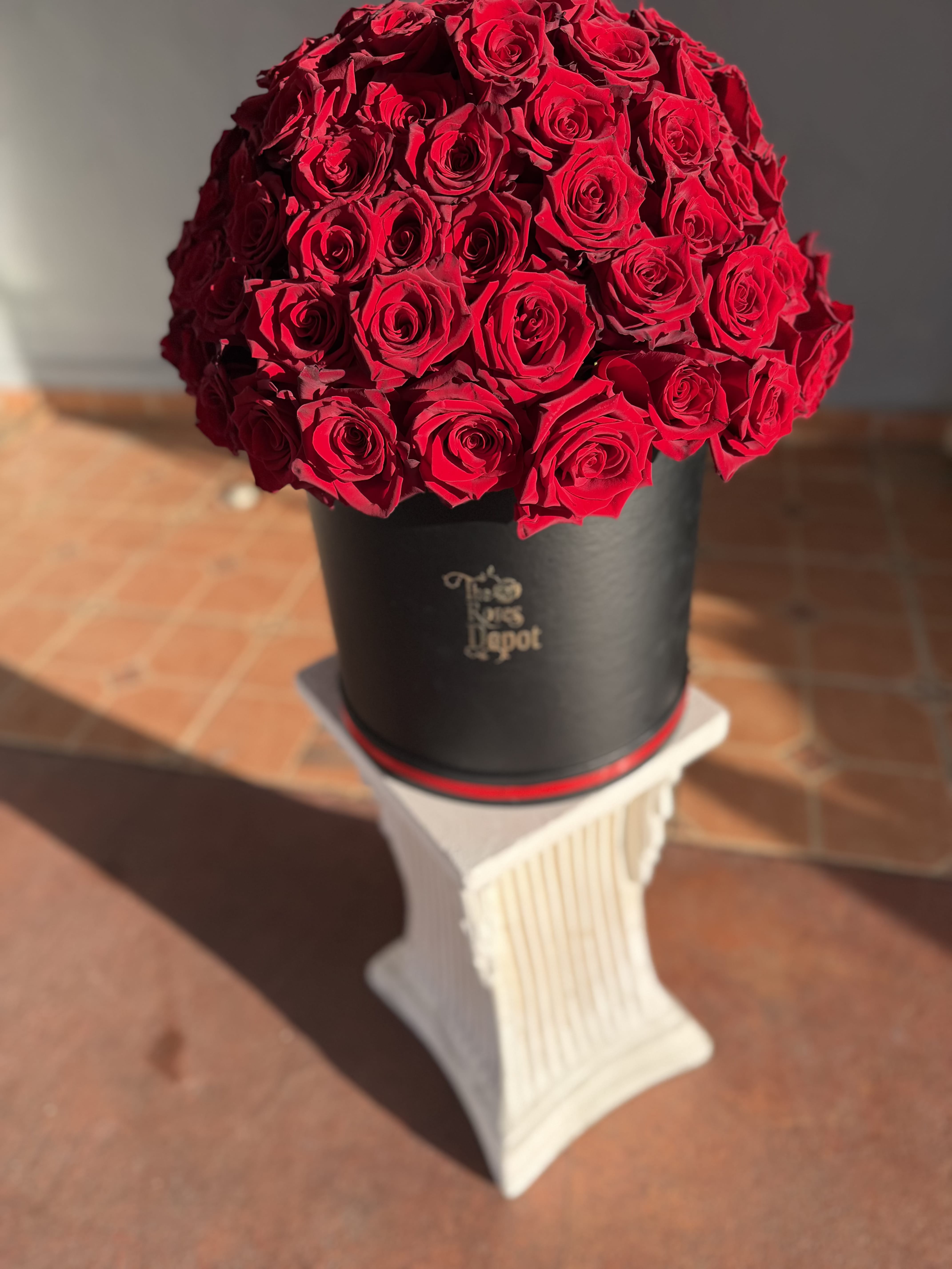80 RED ROSES BOX - Make every occasion unforgettable with our elegant 80 Red Roses Box, carefully arranged in a luxurious gift box. Grown in Ecuador and selected for their exceptional beauty, vibrant color, and long-lasting freshness, these roses create a timeless expression of love and admiration.  Perfect for anniversaries, birthdays, Valentine's Day, proposals, or any romantic celebration, this sophisticated floral arrangement is designed to impress from the moment it is received.