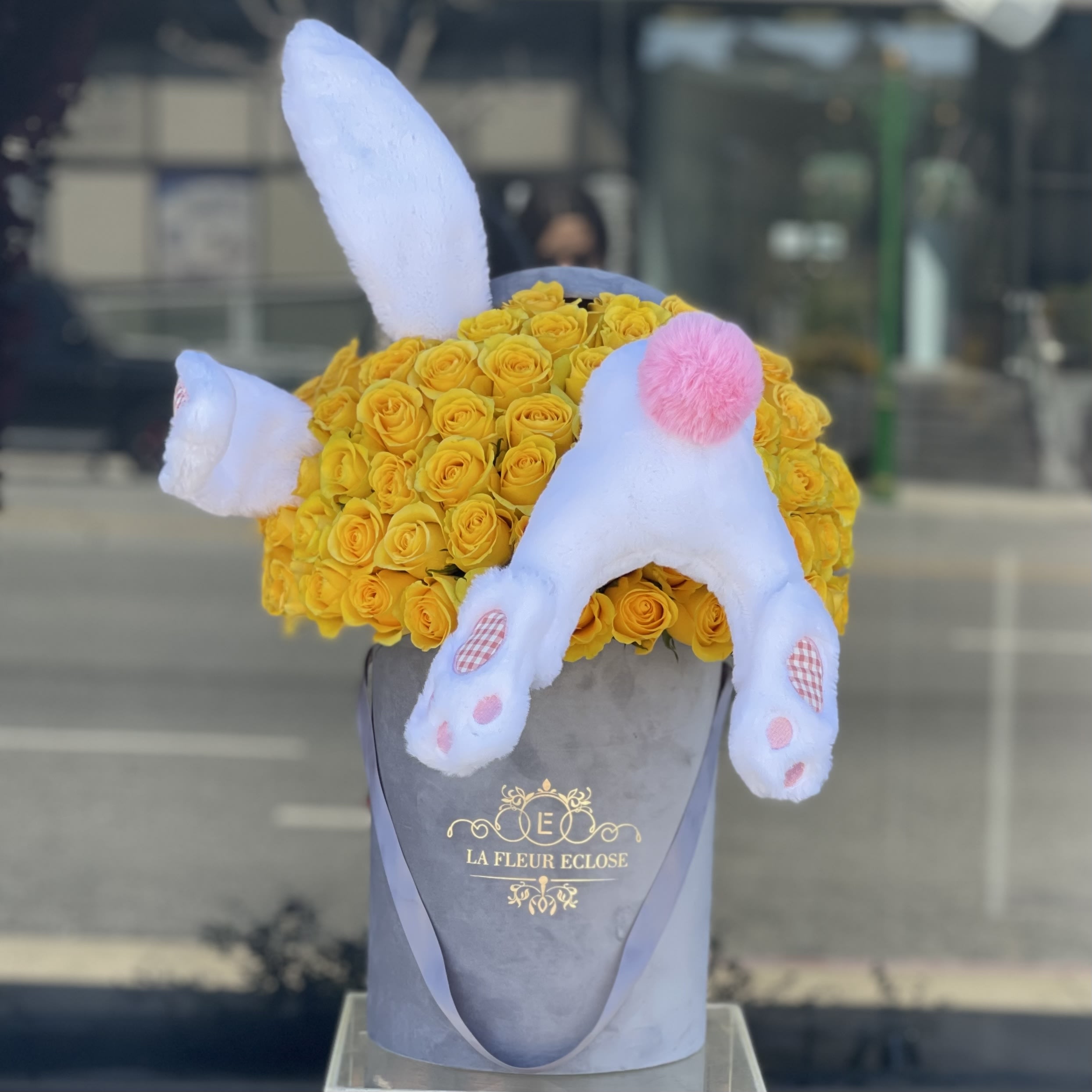 Bunny Me Yellow - Standard-50 yellow roses in a signature box with a bunny Deluxe- 75 yellow roses