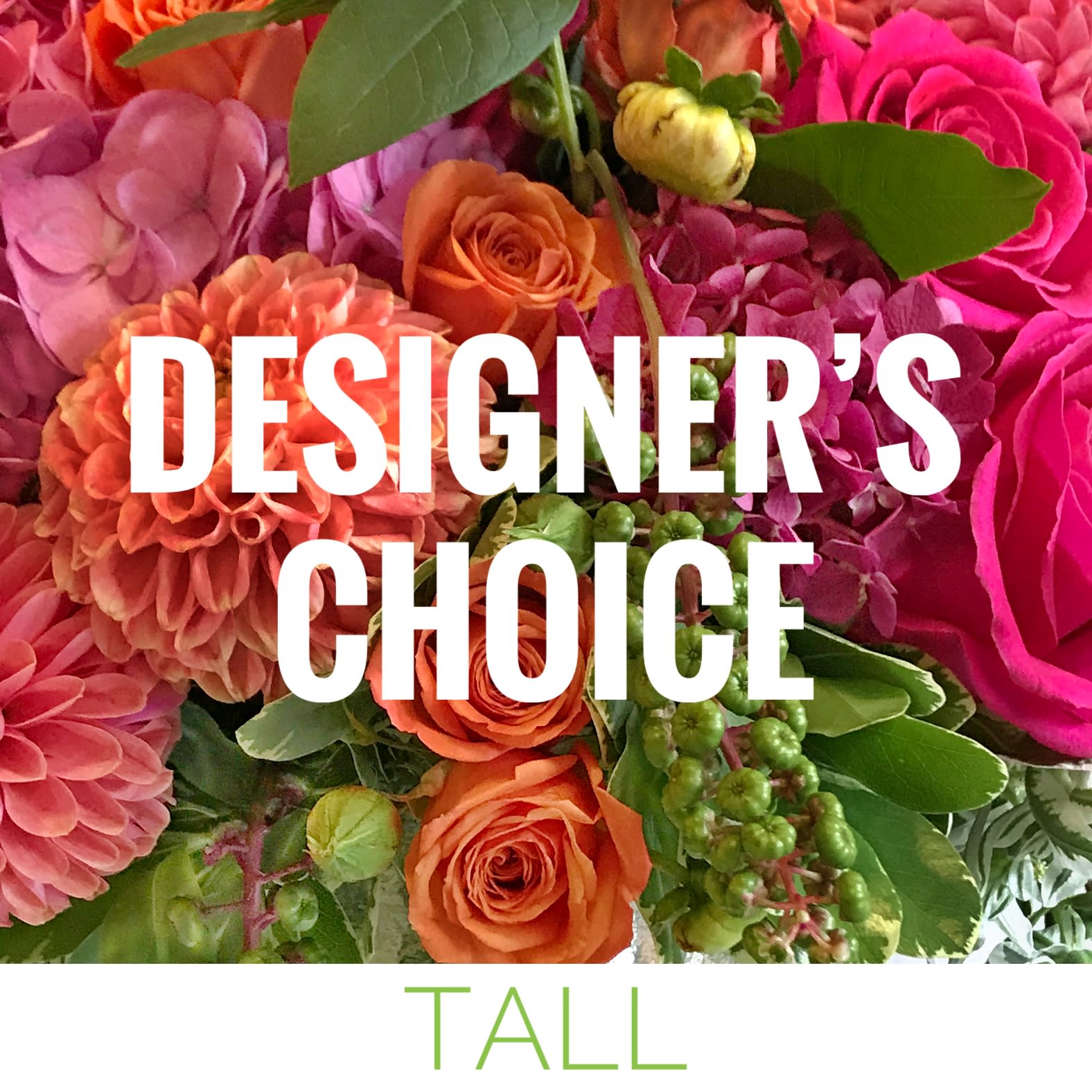 Mixed bouquet of pink, orange, and magenta flowers with green leaves