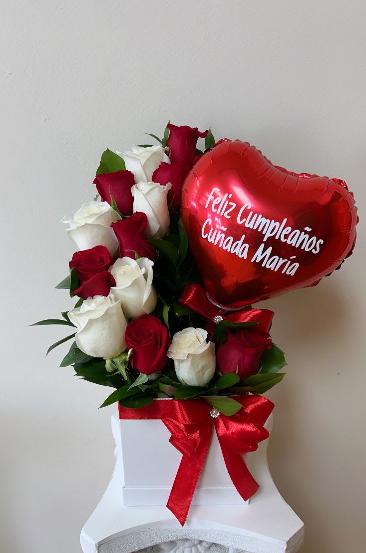 Red and white roses with a red heart balloon in a white box