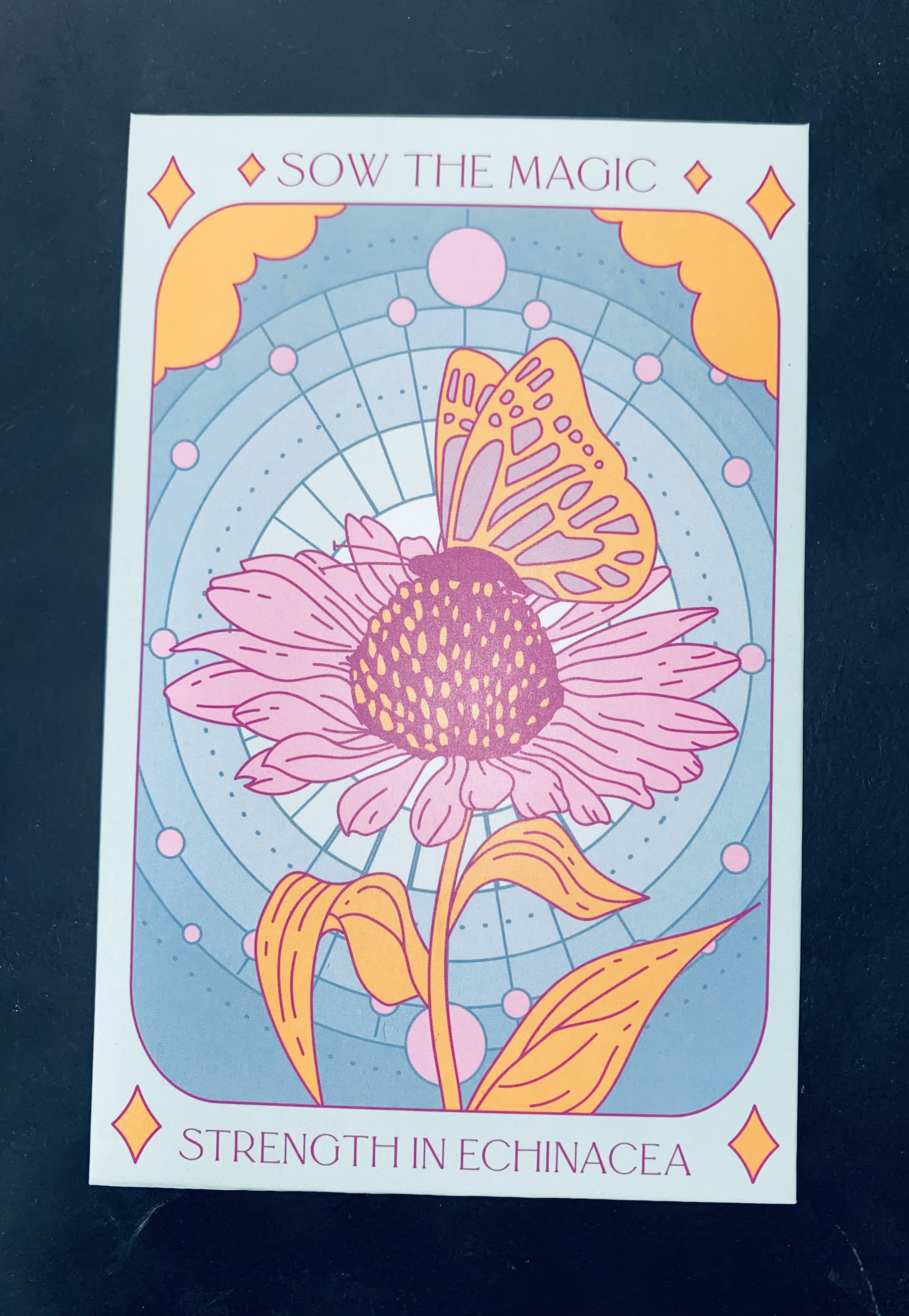 Illustrated pink coneflower card with the text "Sow the Magic"