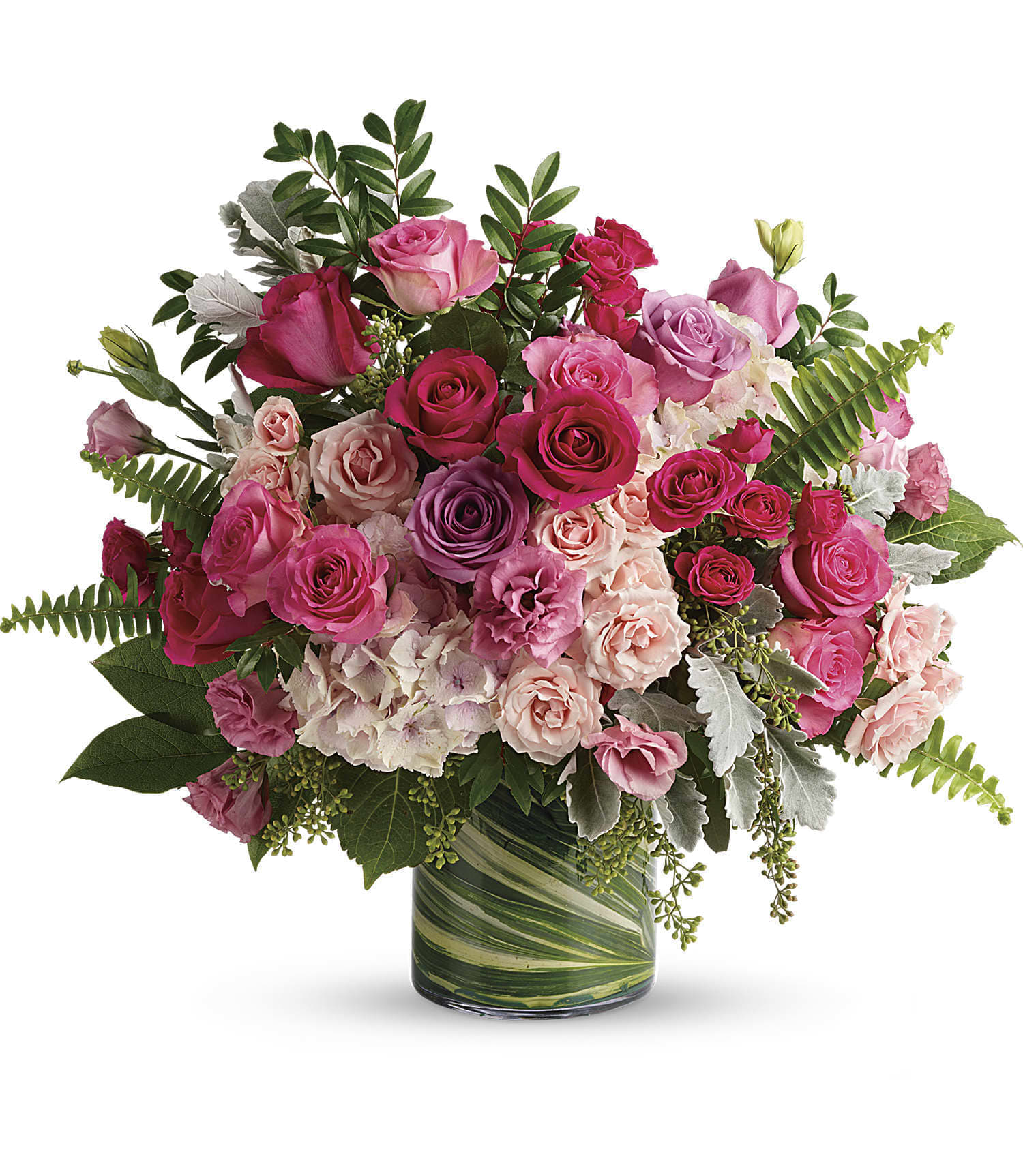 Pink and purple rose bouquet in a glass vase