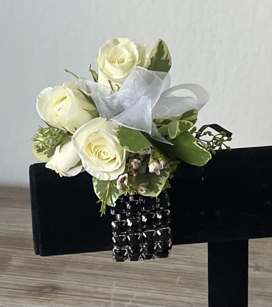 White rose bouquet with ribbon and black jeweled bracelet