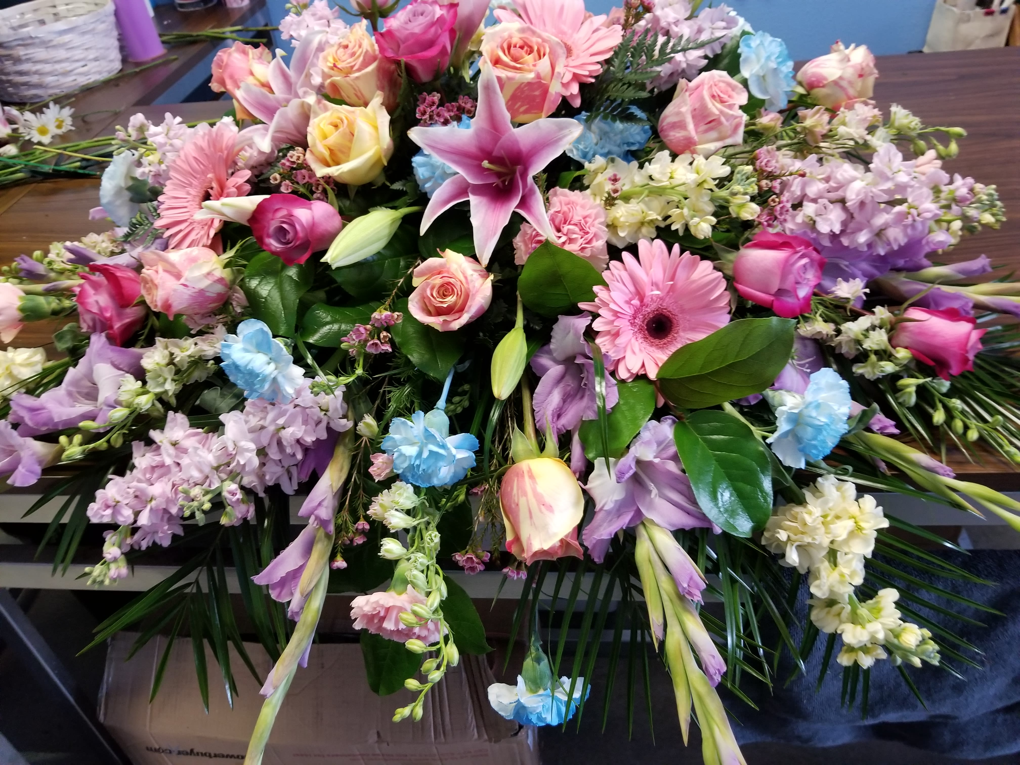 Large mixed bouquet with pink, purple, blue, and white flowers