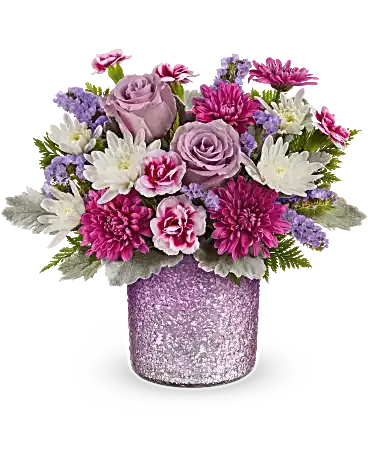 Radiant Reverie Bouquet - Make Mom's day shine with Teleflora's Radiant Reverie cylinder vase, featuring a textured and shimmering gradient finish in soft purple-an elegant keepsake perfect for displaying a dreamy Mother's Day bouquet. Teleflora's Radiant Reverie Bouquet features light lavender roses, variegated purple miniature carnations, purple cushion spray chrysanthemums, white cushion spray chrysanthemums, lavender sinuata statice, dusty miller, and leatherleaf fern. Arranged in a textured, shimmering purple gradient vase, it's a perfect Mother's Day gift. Orientation: All-Around