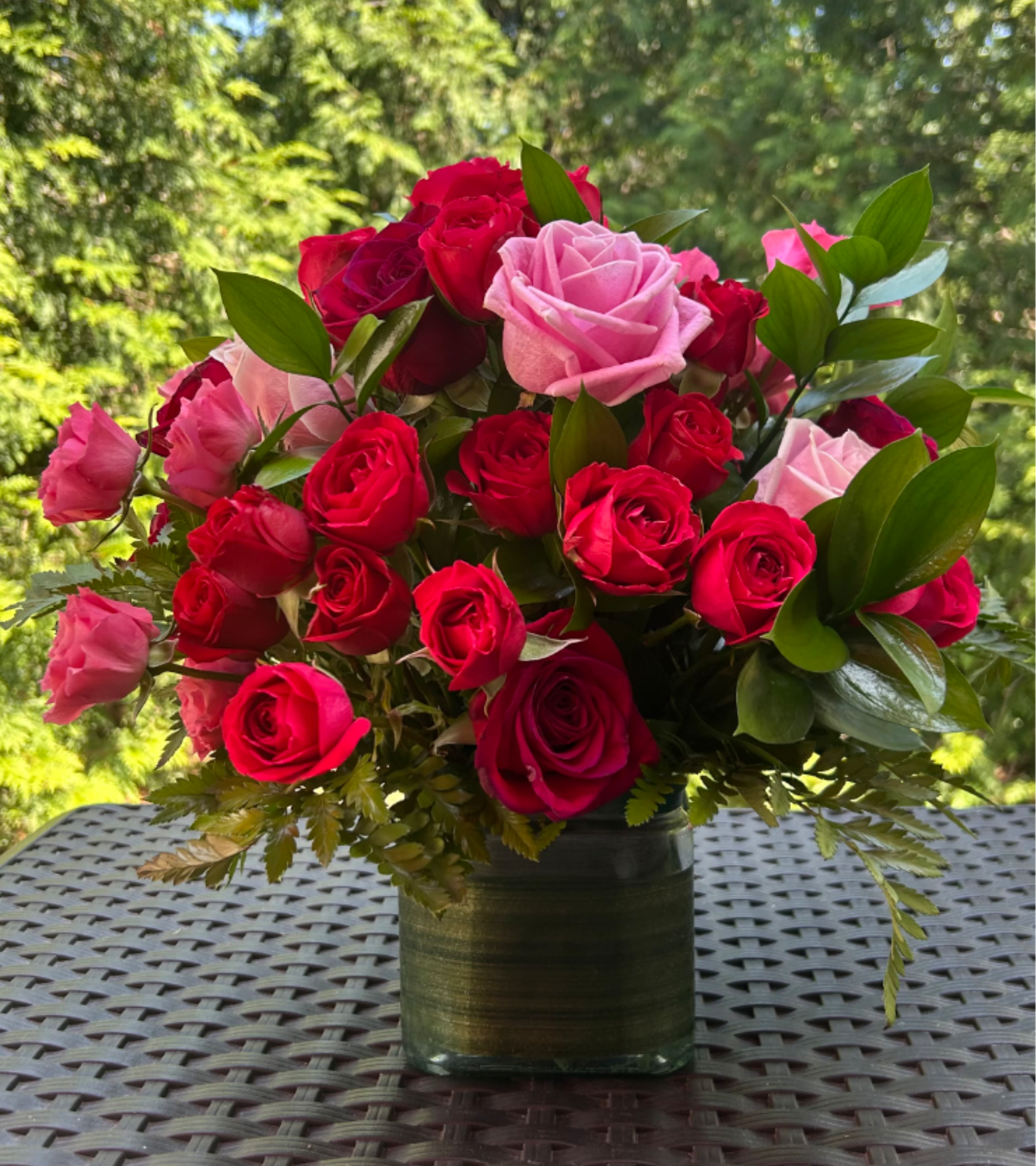 Foxy - This arrangement a true symbol of luxury.  Bloom Details: Red &amp; Pink Roses, Red &amp; Pink Spray Roses and fine foliage  Crystal Clear Glass Vessel All Occasion  Place your Order Online Monday to Saturday before 1:00 p.m. (E.T.) for same-day delivery. “Orders received after hours will be delivered the next business day”. Check our coverage area. Occasionally, substitutions of flowers and/or containers happen due to weather, seasonality, and market conditions which may affect availability. If this is the case with the gift you’ve selected, we will ensure that the style, theme, and color scheme of your arrangement are preserved and will only substitute items of equal value or higher value.  CARE INSTRUCTIONS Keep the flower arrangement hydrated with natural water and change the water every two days. Do not spray any cleaning product on the flower arrangement. Do not place heavy objects directly on the flower arrangement. Keep flower arrangements out of direct sunlight and extreme heat.