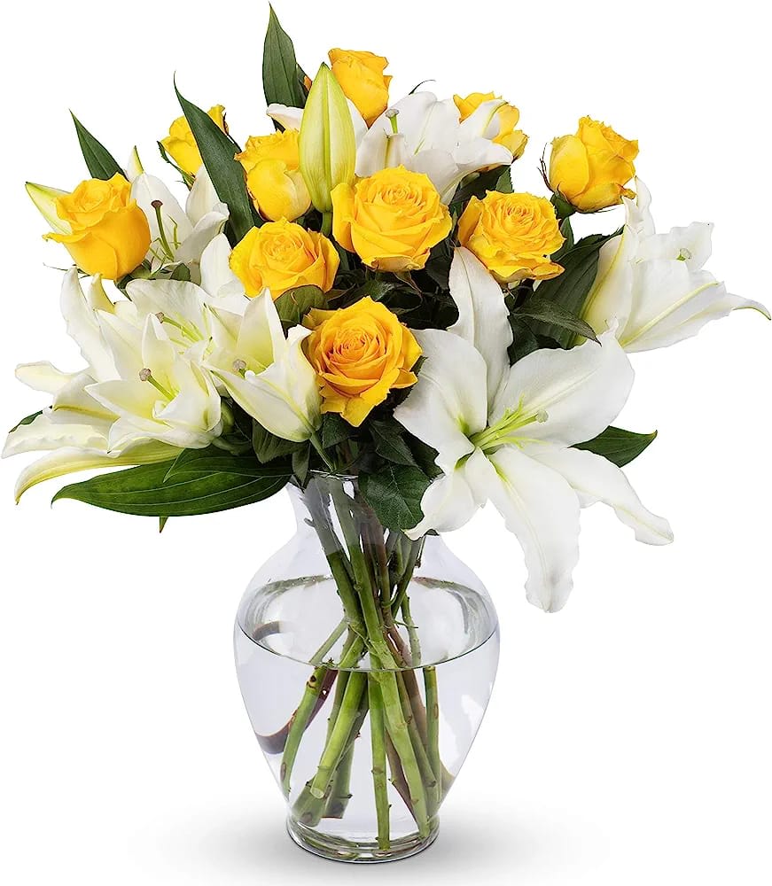 Yellow Roses and White Lilys - Due to current supply shortages, some substitutions of flowers and containers (hat box/vase) may be required. We will ensure that the overall look and feel of the gift you selected is preserved. All upgrade arrangements come without a vase - if you wish to purchase one please call us at (347) 492-5777. Thank you for your understanding and support.
