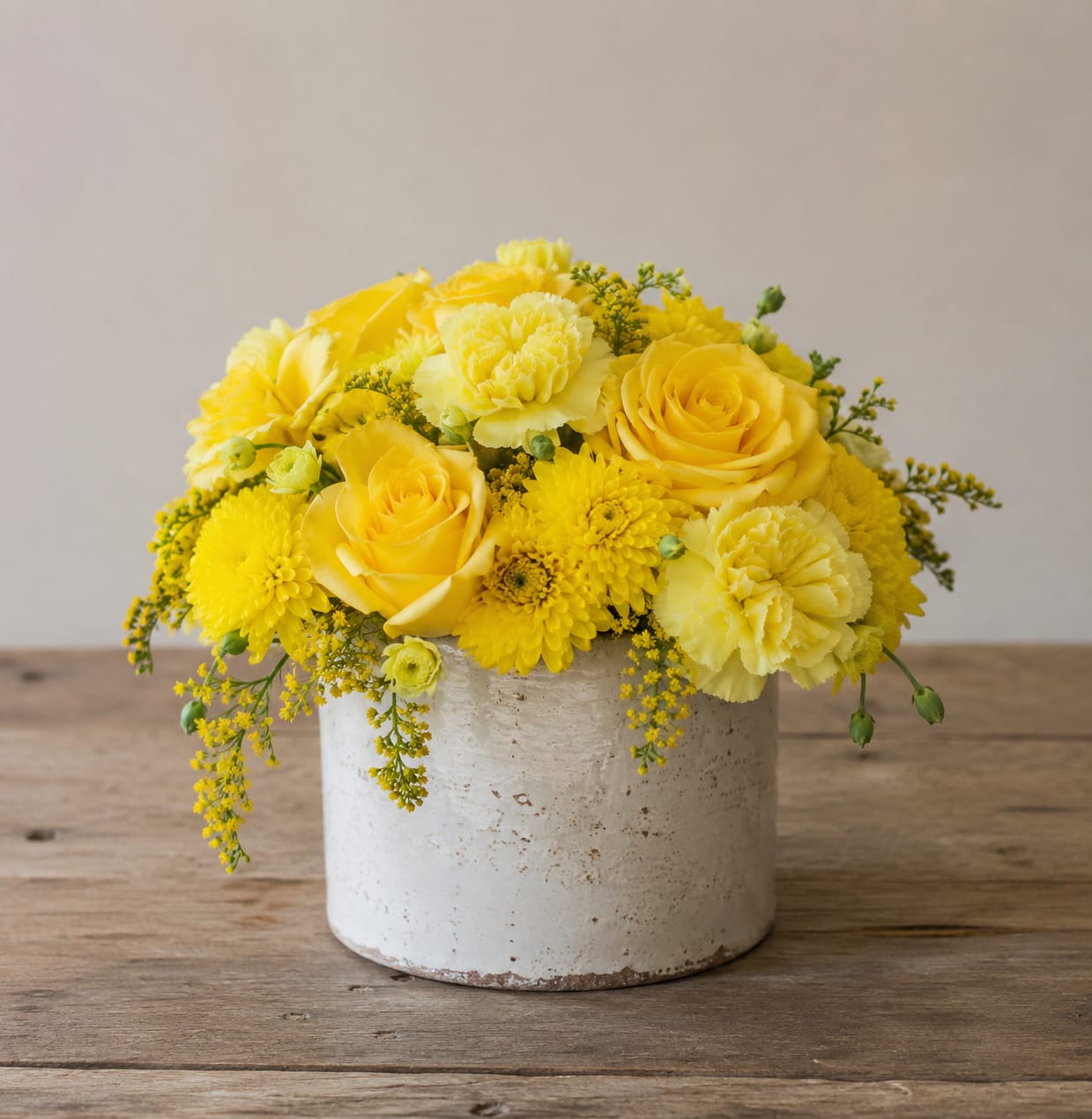 Petal Perfection's Tampa Bay Summer Sunshine - Bright yellow roses and sunny yellow chrysanthemums create an instant lift in this cheerful flower arrangement-perfect as a birthday bouquet, a thank-you gift, or a spring celebration. The compact, rounded presentation in a clean white ceramic vase gives the Tampa Bay Summer Sunshine arrangement a modern, fresh look that makes the recipient feel warmly celebrated and noticed.  With Delivery all over the Tampa Bay area, including Tampa, Brandon, Valrico, Riverview, Apollo Beach, Bradenton and points in between! Displayed in a low white ceramic vase, the arrangement reads bright and contemporary; its compact shape suits tabletops, desks, or entryway consoles. It's the kind of bouquet that says "you made my day" in a sunny, uncomplicated way-easy to order and ready to brighten someone's space.