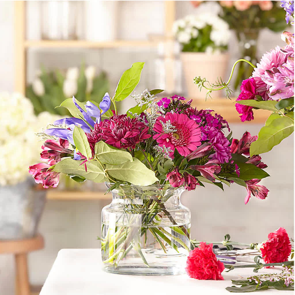 Regal Jewel Bouquet - The colors or floral varieties used in this bouquet may vary based on freshness and availability. The actual design you or your recipient will receive will differ from the images shown here. Standard 6x6 glass vase. Deluxe 6x6 glass vase. Premium 8x6 glass vase.