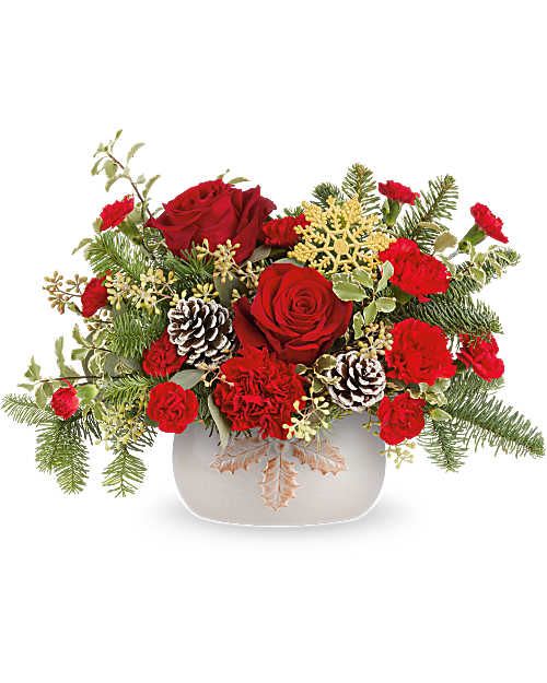 Teleflora's Holly Season Centerpiece - Teleflora's Holly Season Bouquet is full of festive charm! Red roses and carnations are hand-arranged with winter greens, pinecones, and golden accents in Teleflora's Holly Season Bowl. This classic Christmas centerpiece adds seasonal style to gatherings all season long.