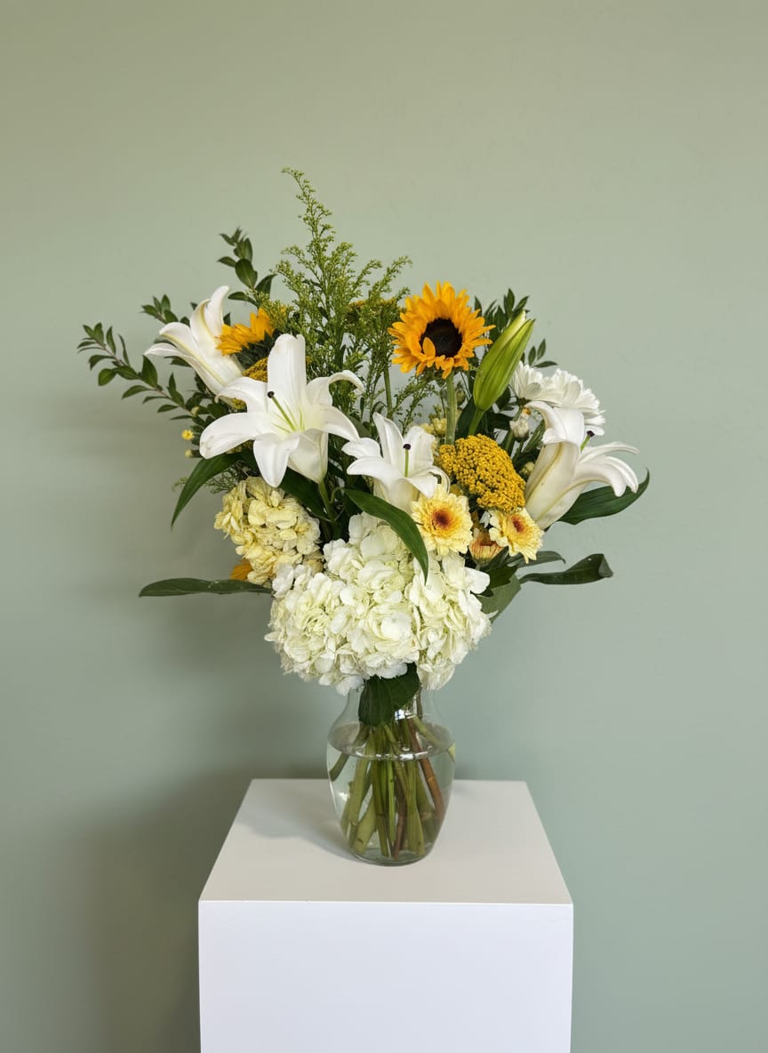 Golden Memories - Send the gift of friendship and beautiful blooms with this delicate and elegant arrangement!  Perfect for a memorial celebration, or just in your home!  These blooms will bring so much light to every room they enter.