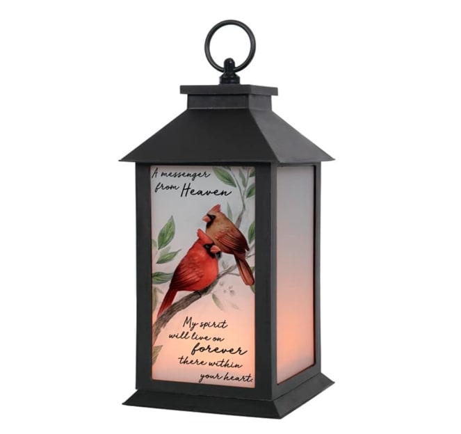 Lantern "Messenger from Heaven"  - This black LED lantern has a cardinal image and the message "A messenger from Heaven...My spirit will live on forever there within your heart" on frosted glass panels. Dimension W: 5.5" H: 13" D: 5.5"