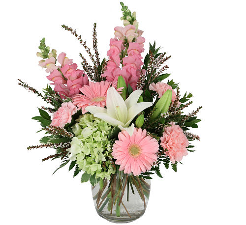 Pink and white mixed bouquet in a clear glass vase