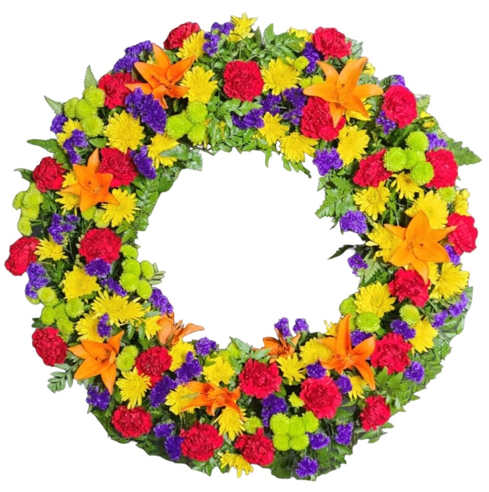 Colorful floral wreath with orange lilies, red carnations, and yellow and purple blooms