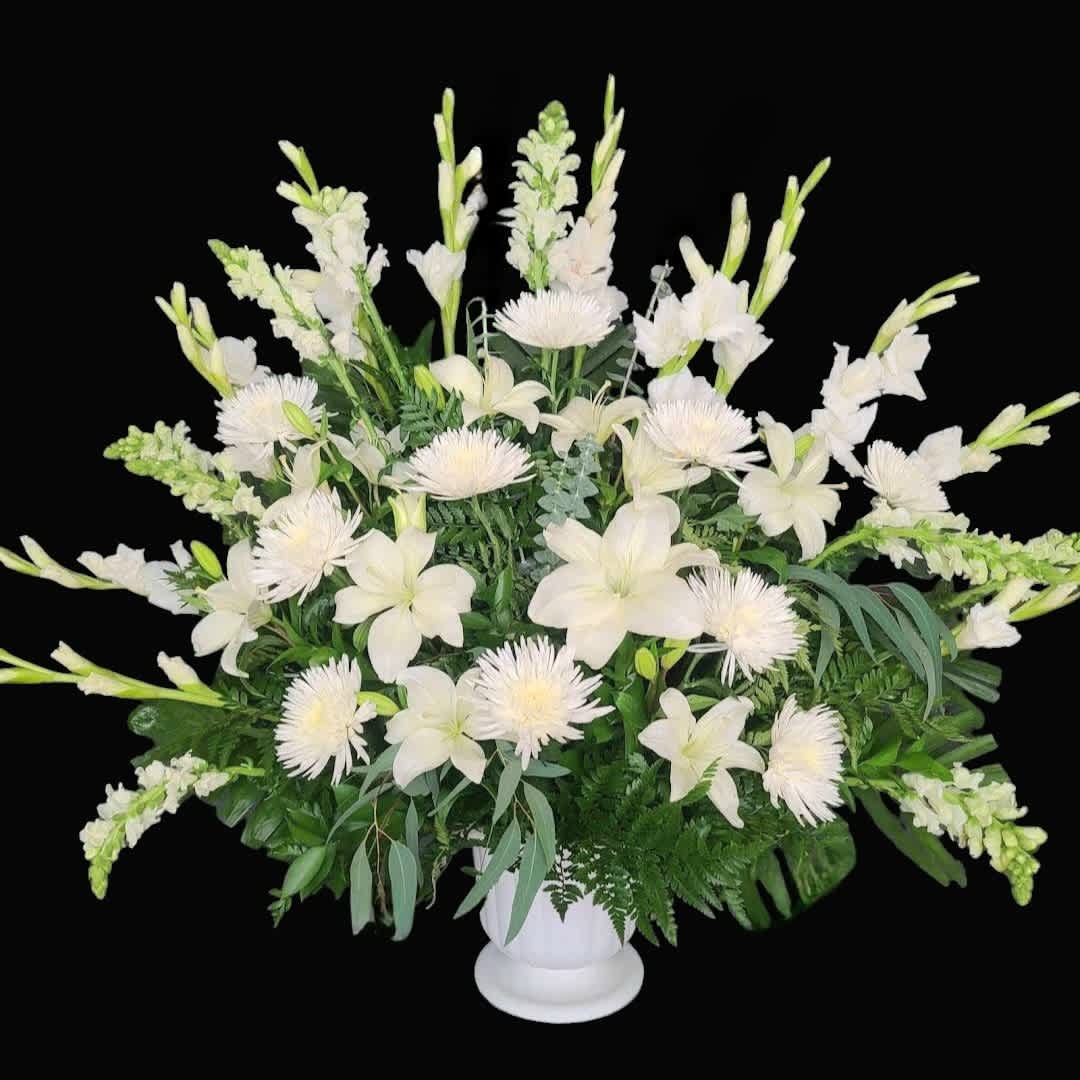 White Hope Arrangement  - An all-white funeral basket featuring an assortment of white blooms which may vary from season to season.  