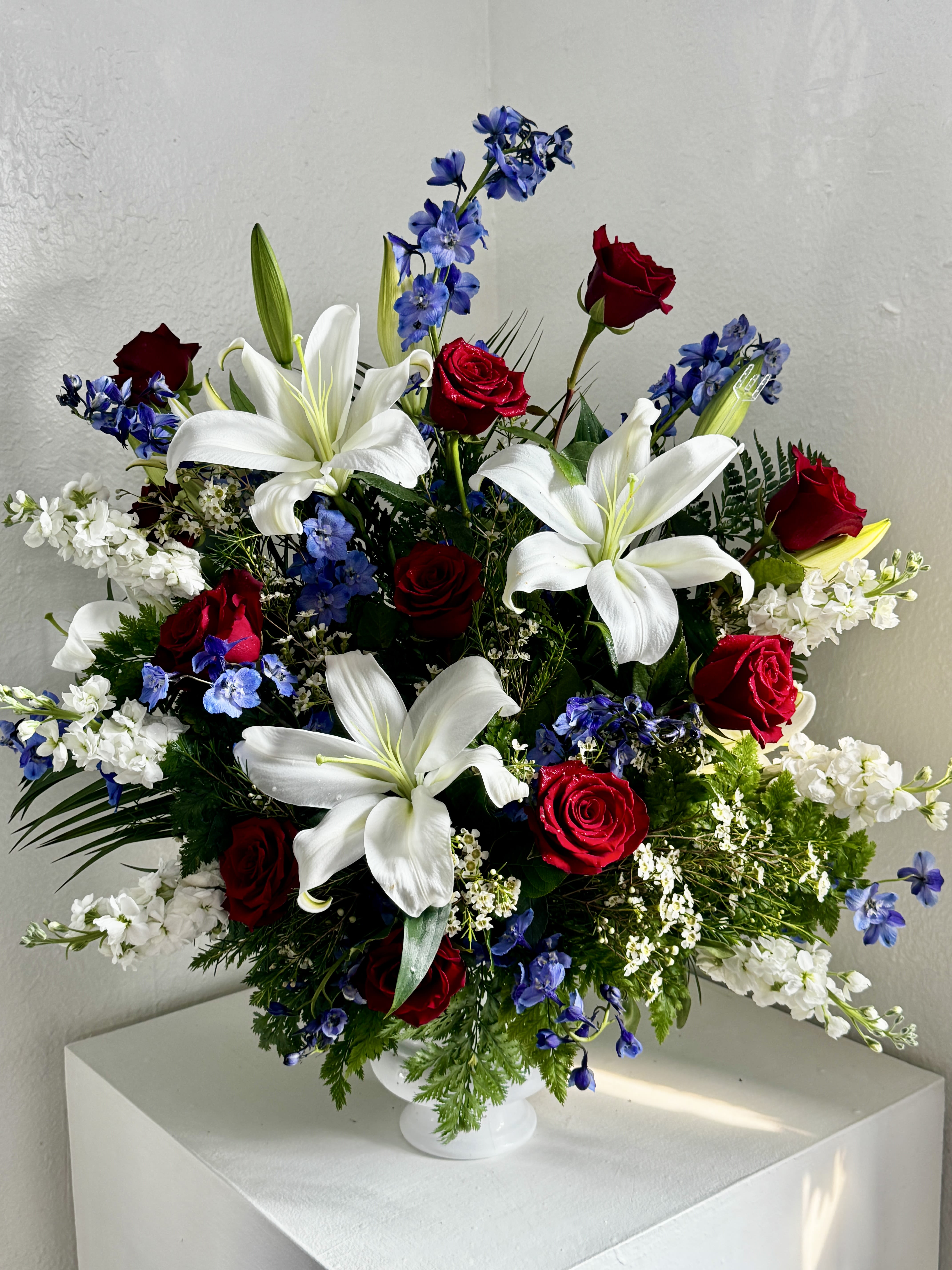 American Tribute - This urn arrangement is perfect for honoring someone with a patriotic flair.