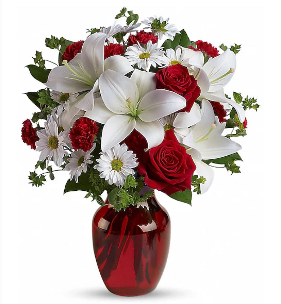 Red roses and white lilies in a red glass vase