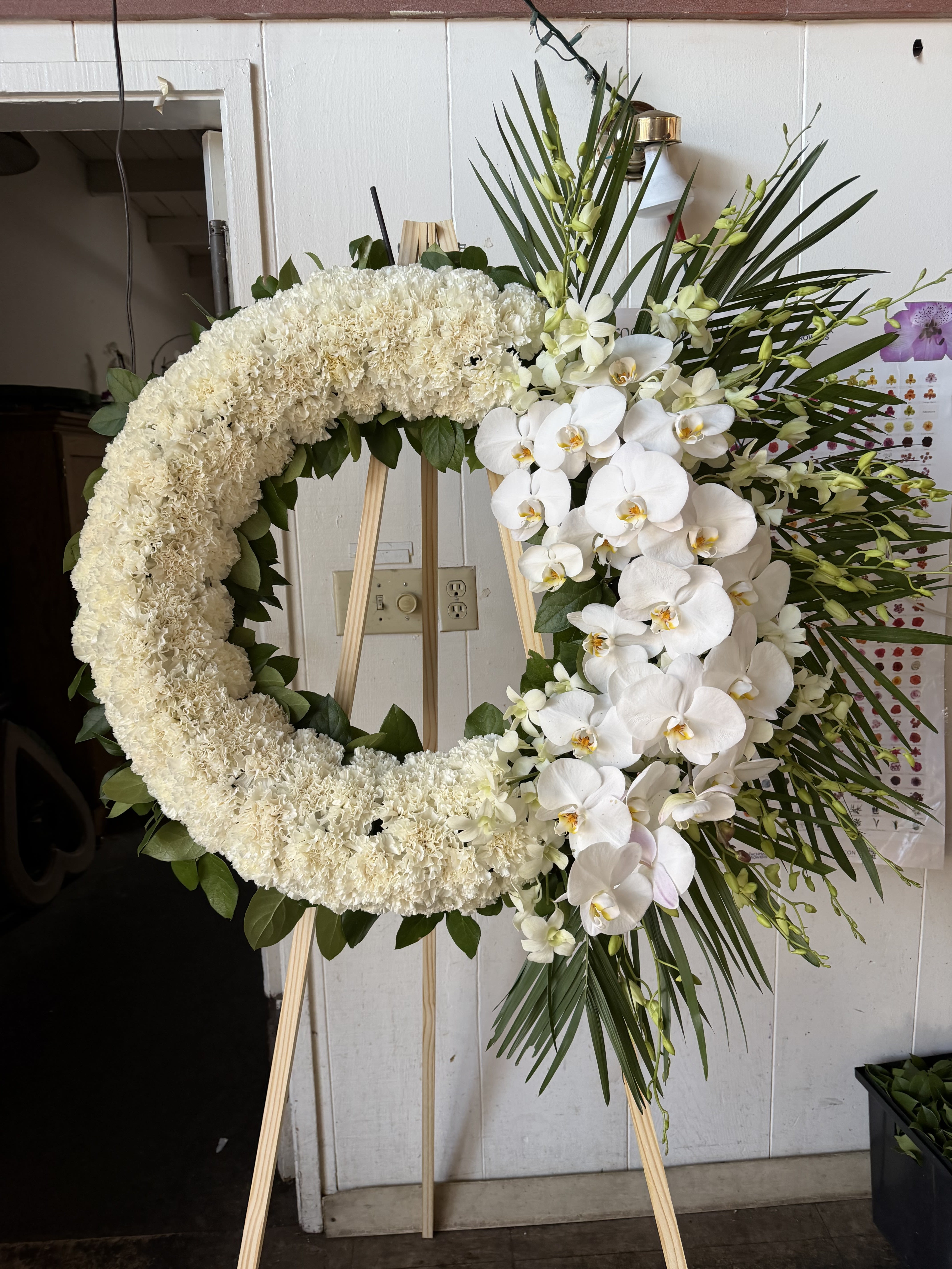 Remembrance Wreath  - 24 Inch Wreath with white orchids , carnations, and gladiolus 
