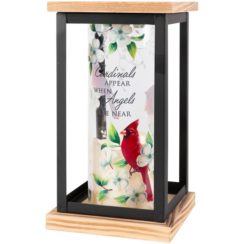 Memorial lantern with black frame, wood base, and glass insert printed with red cardinal, white blossoms, and sympathy quote