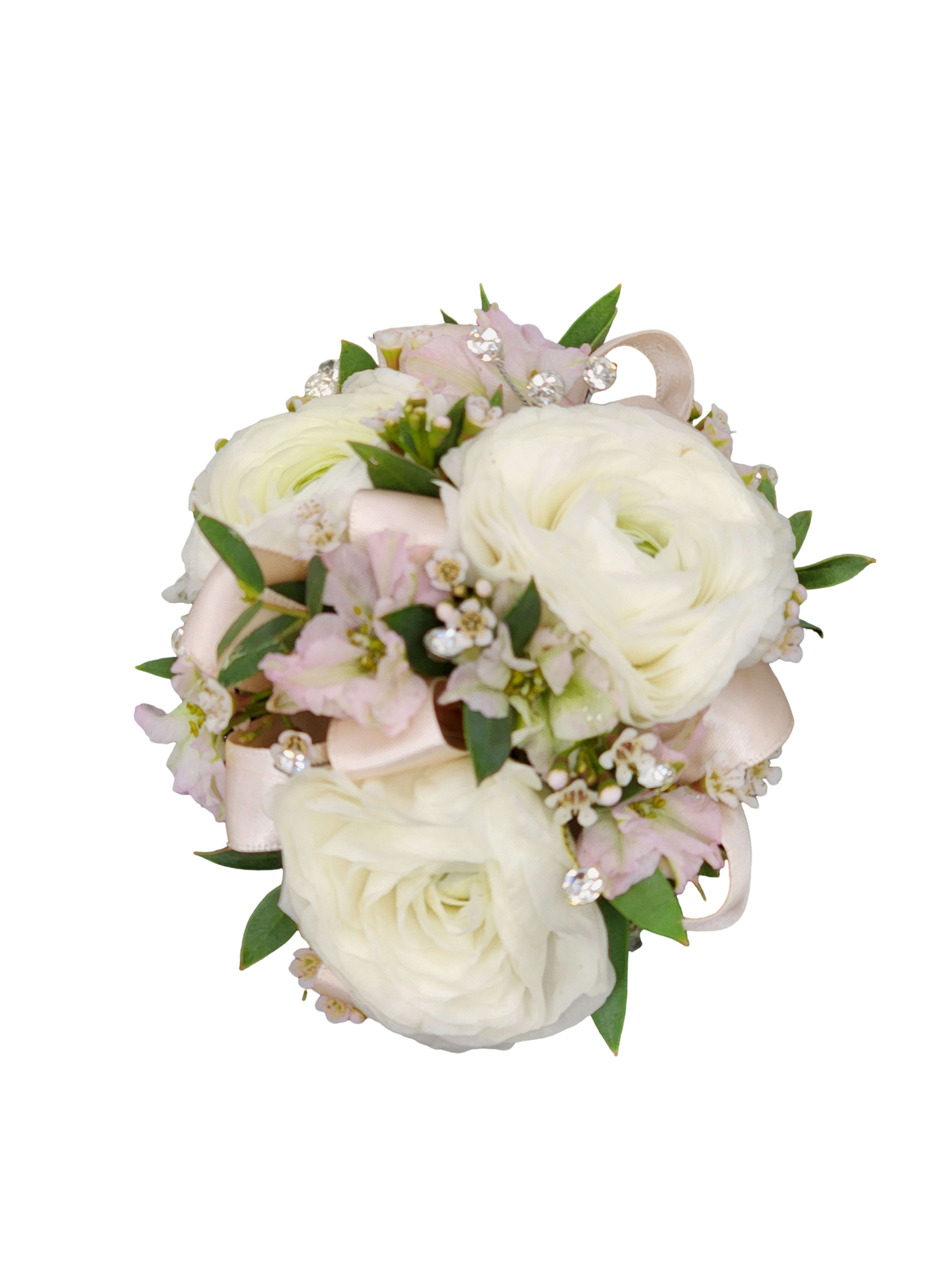 Blushing Elegance Wristlet - Choose this traditional and modern wristlet corsage with blush satin ribbon and silvery rhinestones accenting ranunculus. Please place in special instructions time of pick up. Greenery may vary.