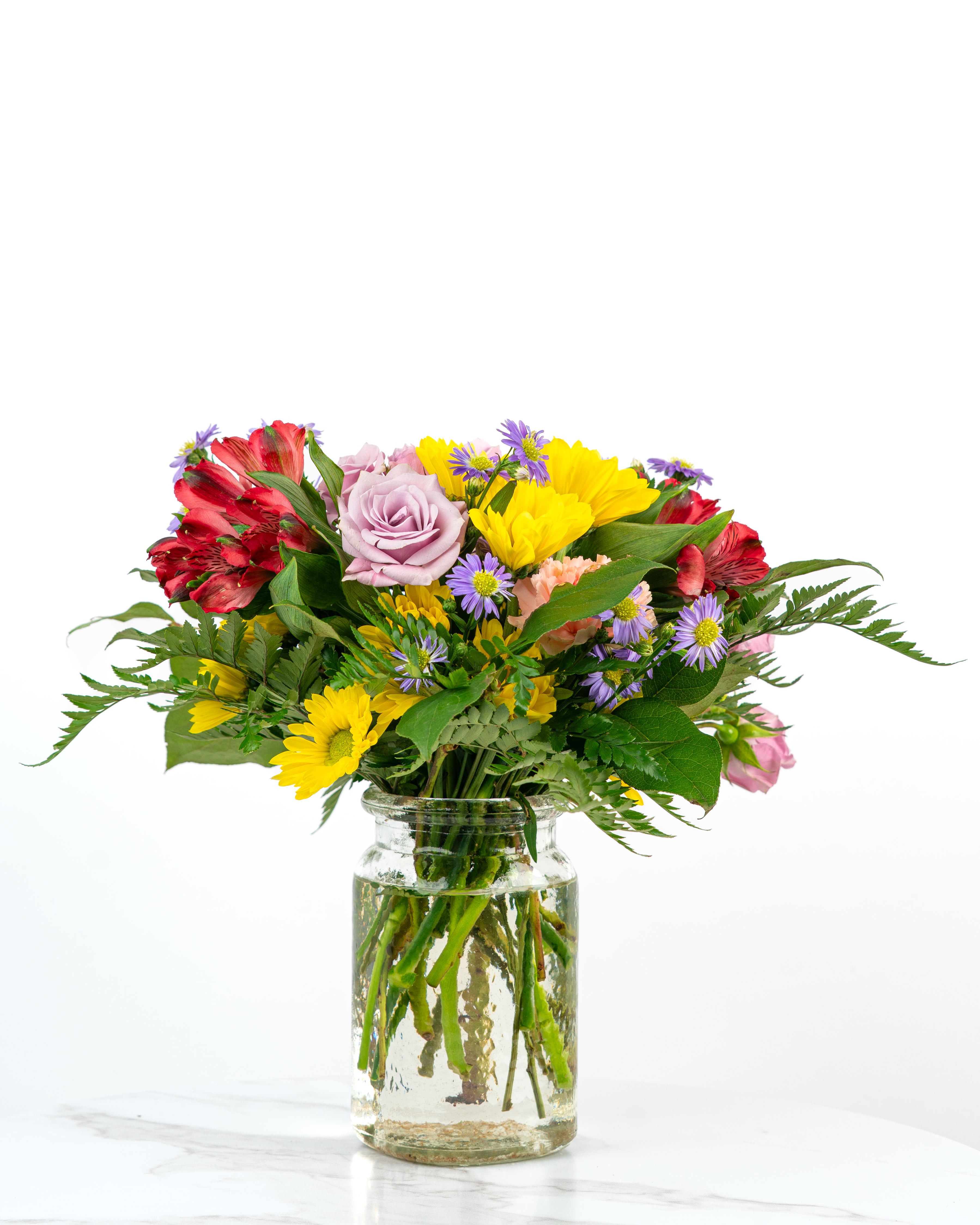 Our Birthday Collection: Brightest Blooming Birthday - Our Blooming Birthday Wishes Collection celebrates birthdays with bright blooms in cheerful hues. The Brightest Blooming Birthday Wishes arrangement is bursting with bold colors to make someone's special day unforgettable. Send birthday wishes with this one of a kind arrangement styled just for your order. Because we always use the freshest blooms, your final arrangement may not look exactly as pictured due to seasonal availability.