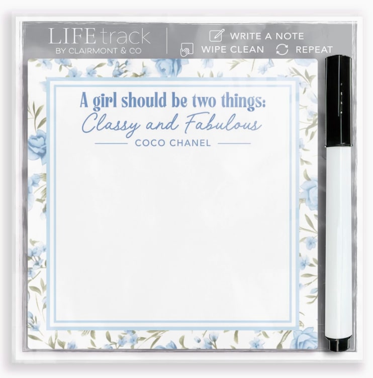 Floral notepad with a pen and a quote at the top