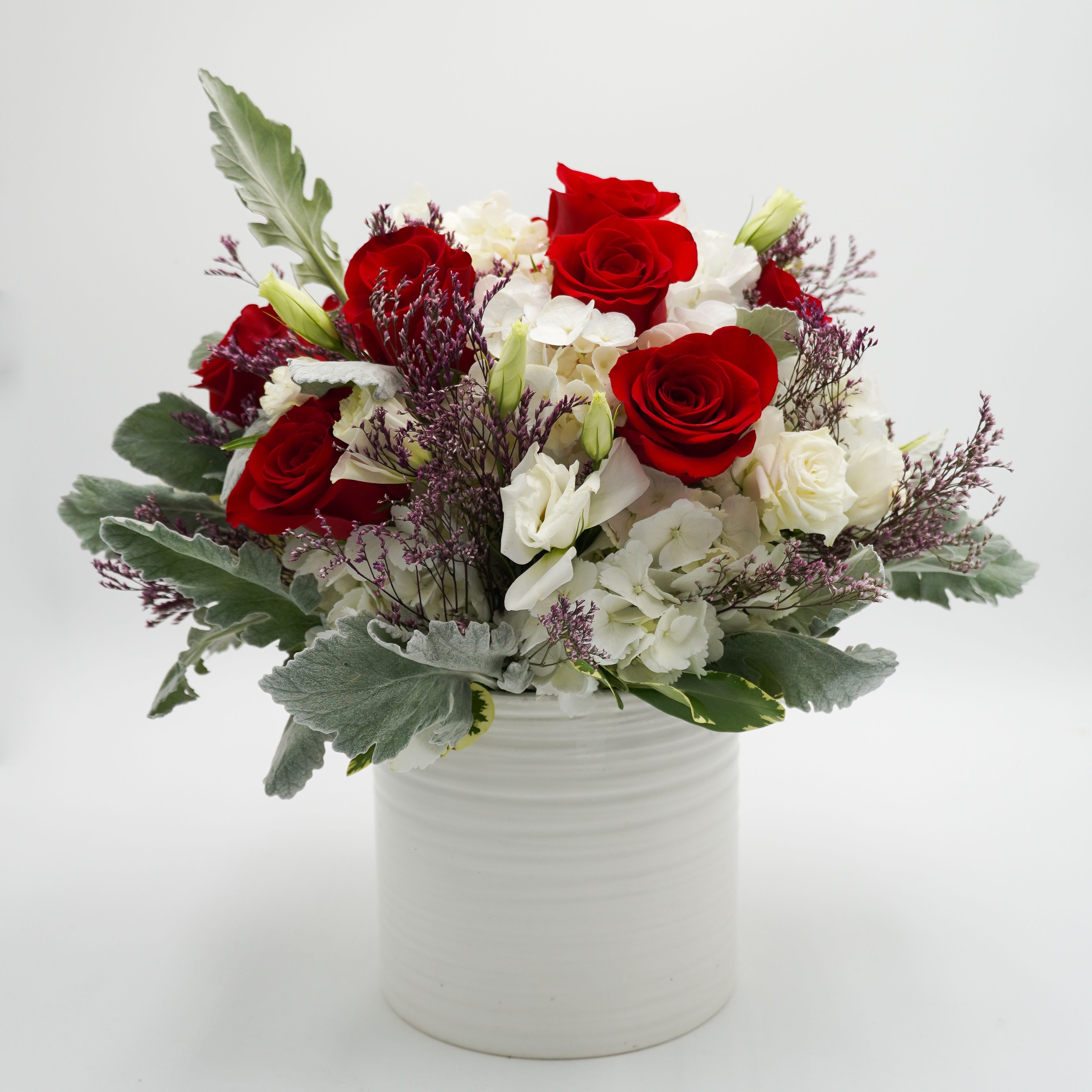 Sweet Red by Atlanta's Finest Flowers  - Send red roses, white hydrangeas, dusty miller and white lisianthus  Bouquet is delivered in a cylinder everest pot   All-Around size 15'H x 13'W   