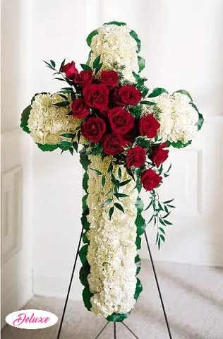 Standing floral cross with red roses and white carnations
