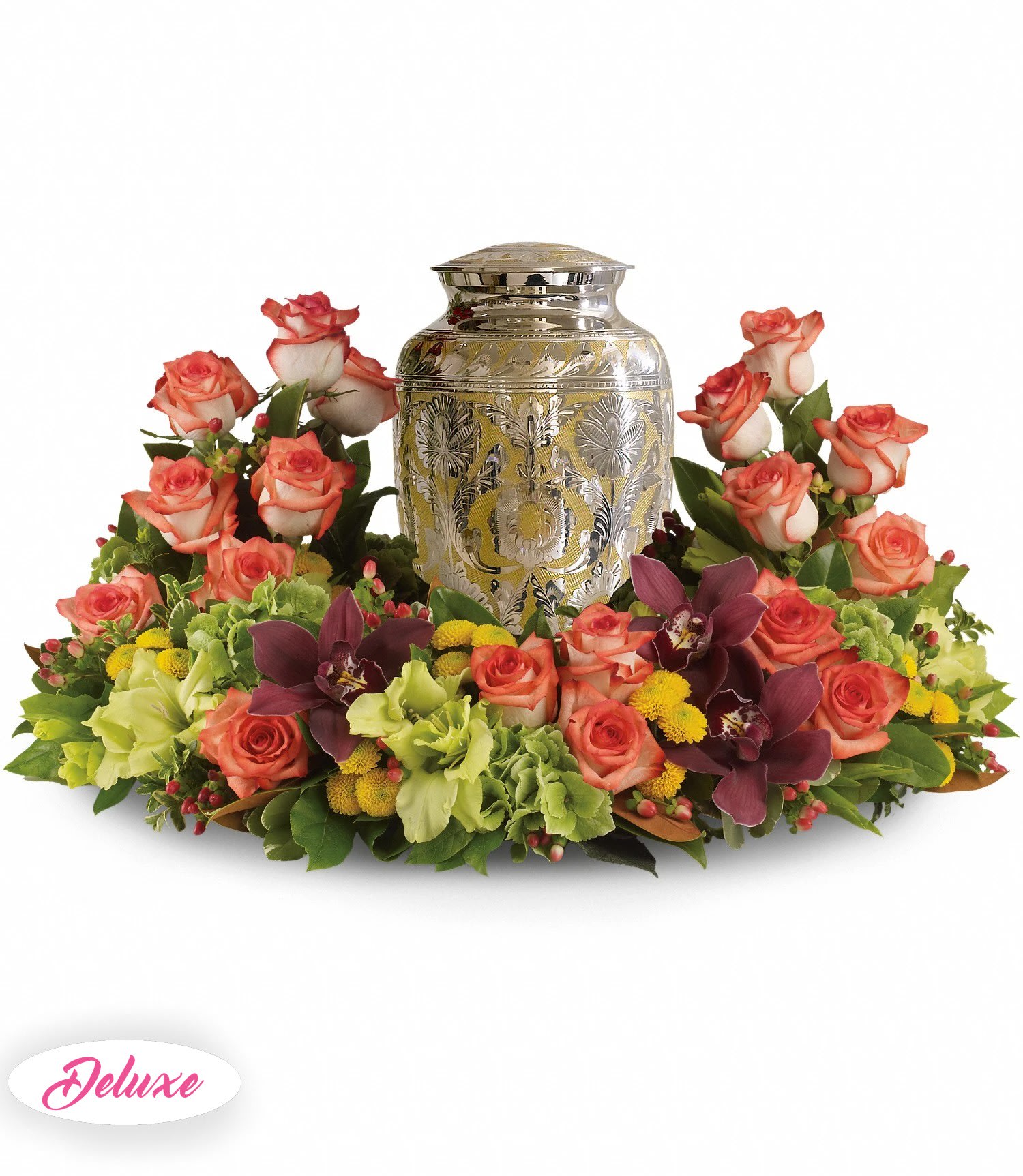 Floral urn arrangement with coral roses and purple orchids around a silver urn
