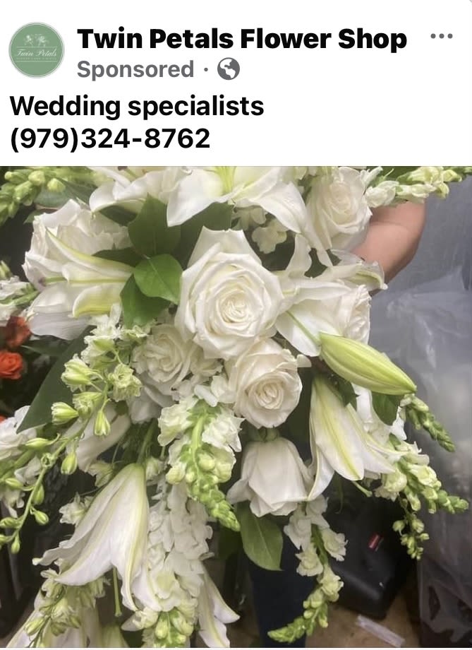 White bridal bouquet with roses and lilies