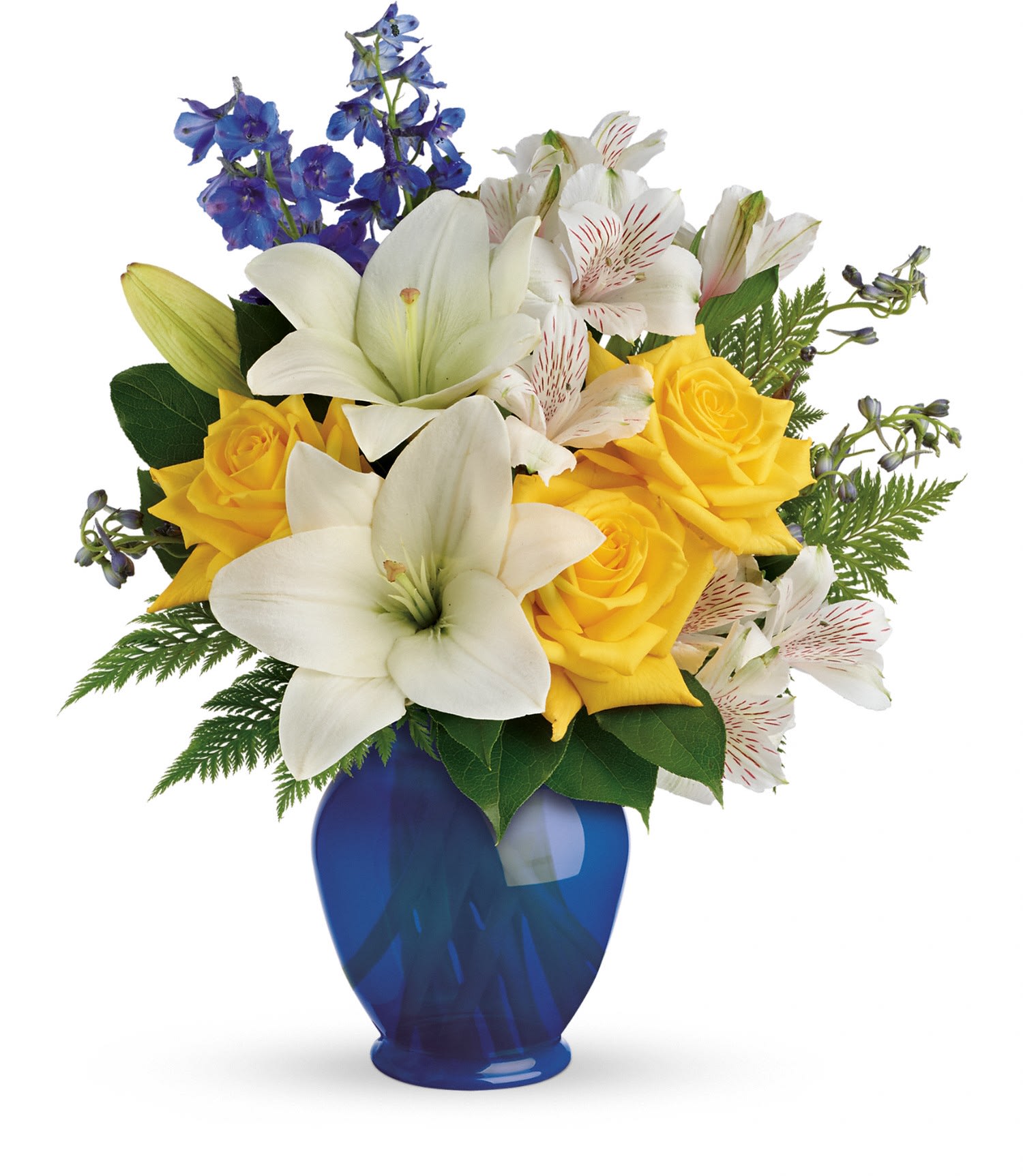 Yellow roses and white lilies in a blue vase with blue delphinium