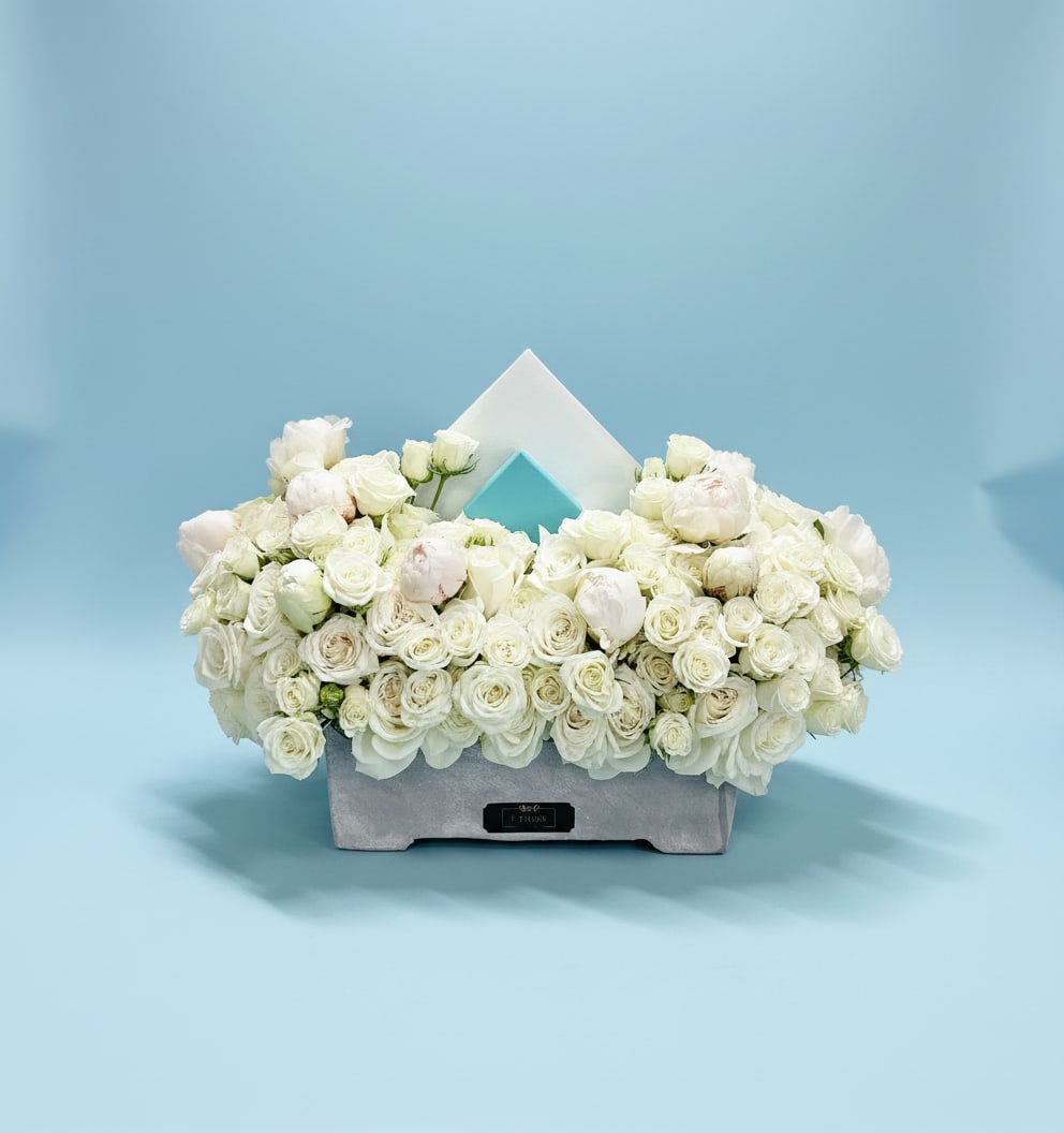 Chic White Harmoy  - Make a bold statement with this elegantly simple design. White roses symbolize hope, honor, adoration, and innocence. Two Dozen White Roses by BloomNationâ¢ is the perfect gift to welcome new beginnings or show your respects.   