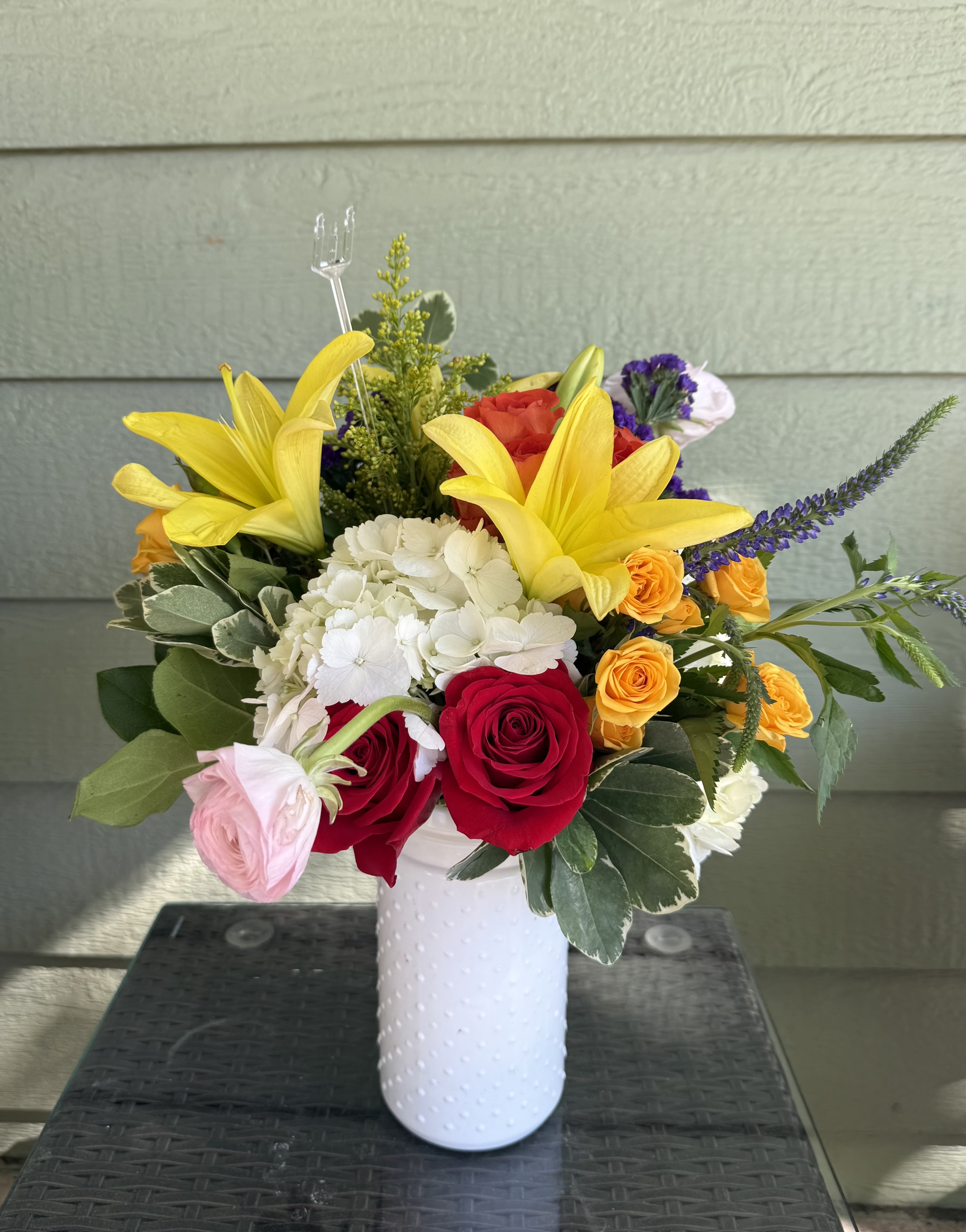 English Garden  - Our English Garden arrangement is a colorful mood booster to bring a little sunshine and happiness to your loved one. 