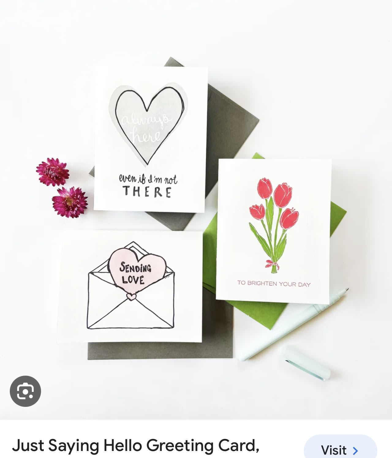 Three greeting cards with heart and tulip designs on envelopes