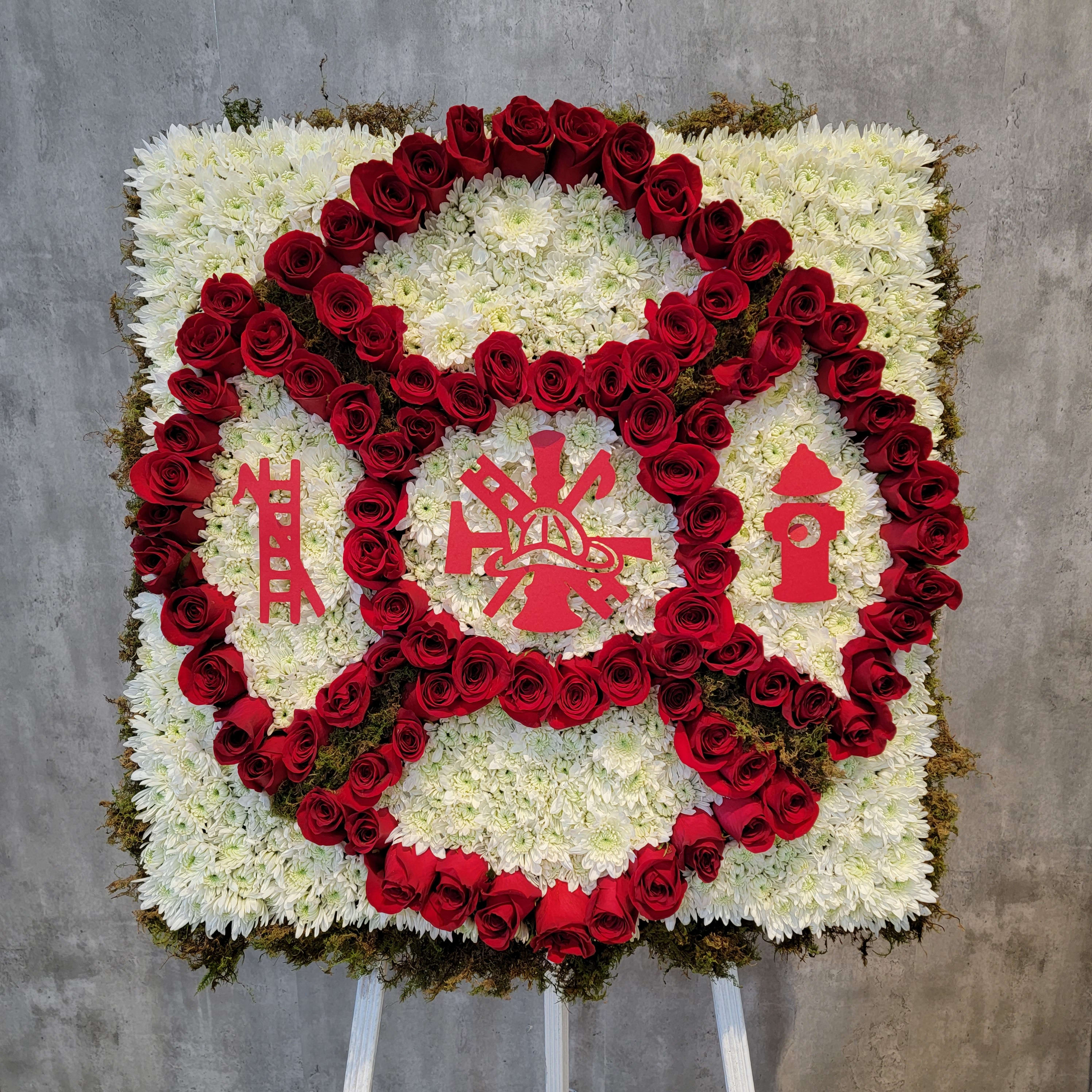 Square floral standing spray with red roses and white chrysanthemums