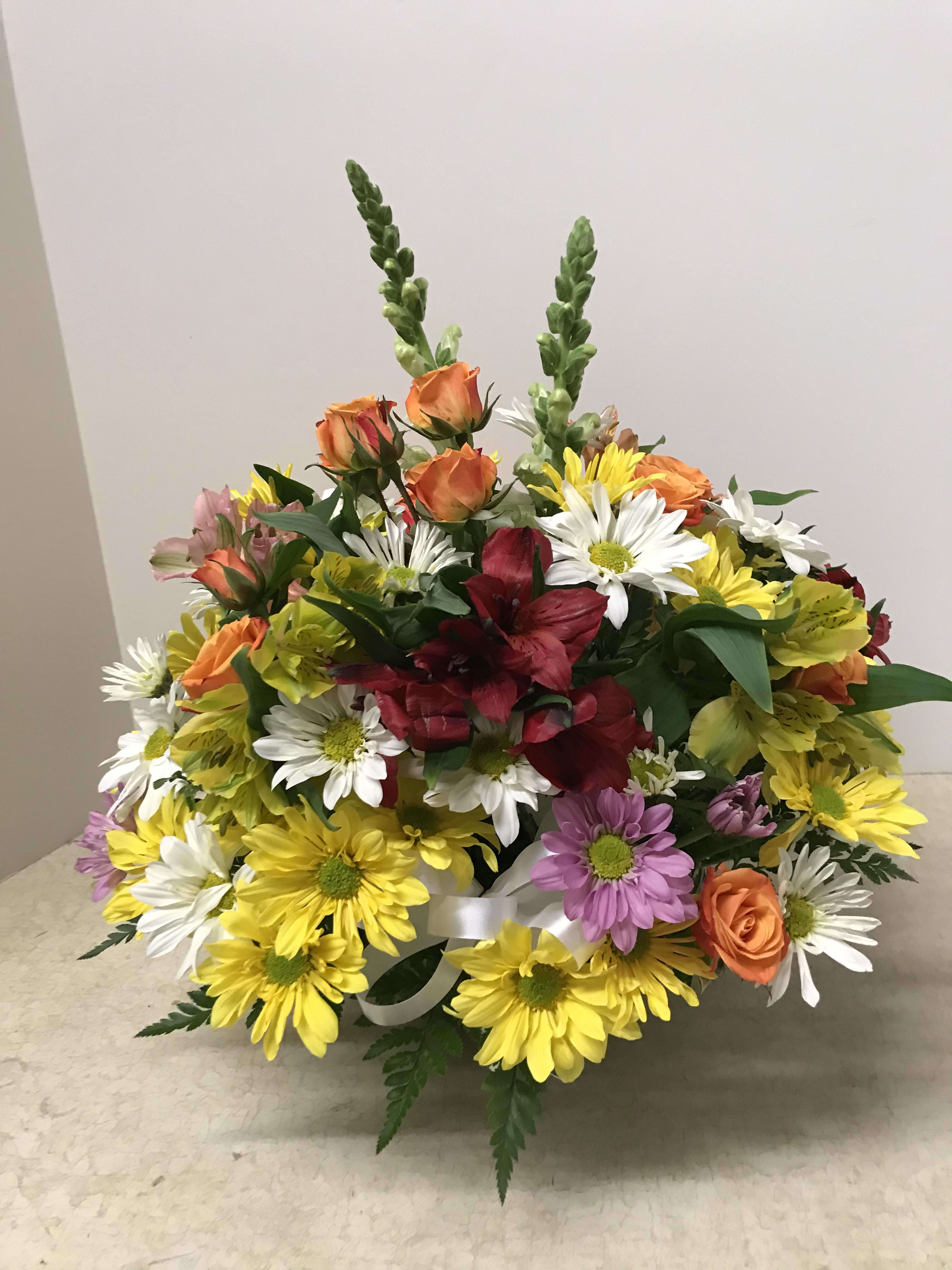 Colorful mixed bouquet with daisies, roses, and alstroemeria