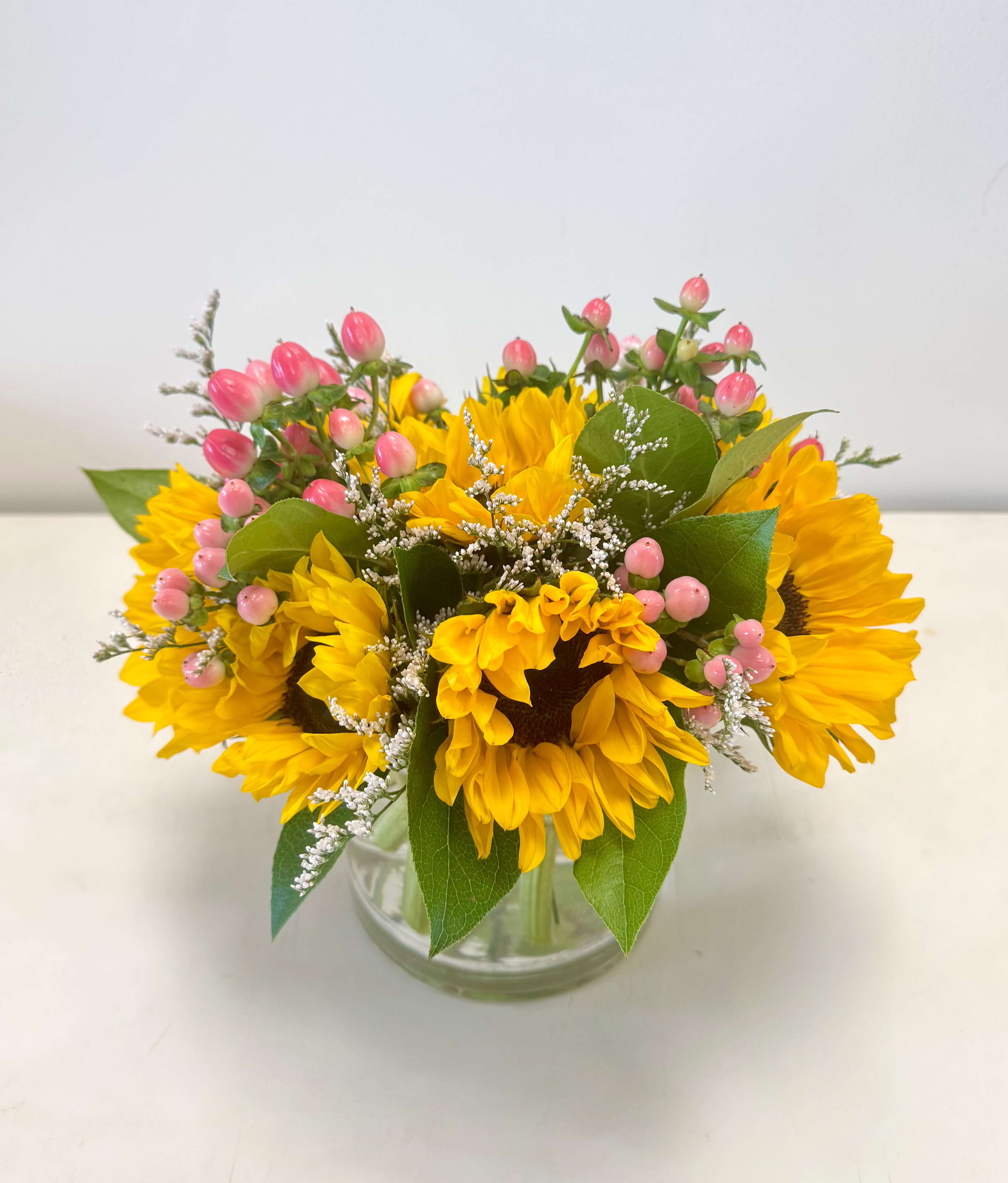 Sunny Sunflowers - A petite bouquet of the happiest flower, sunflowers.  Guaranteed to add some sunshine to your day!