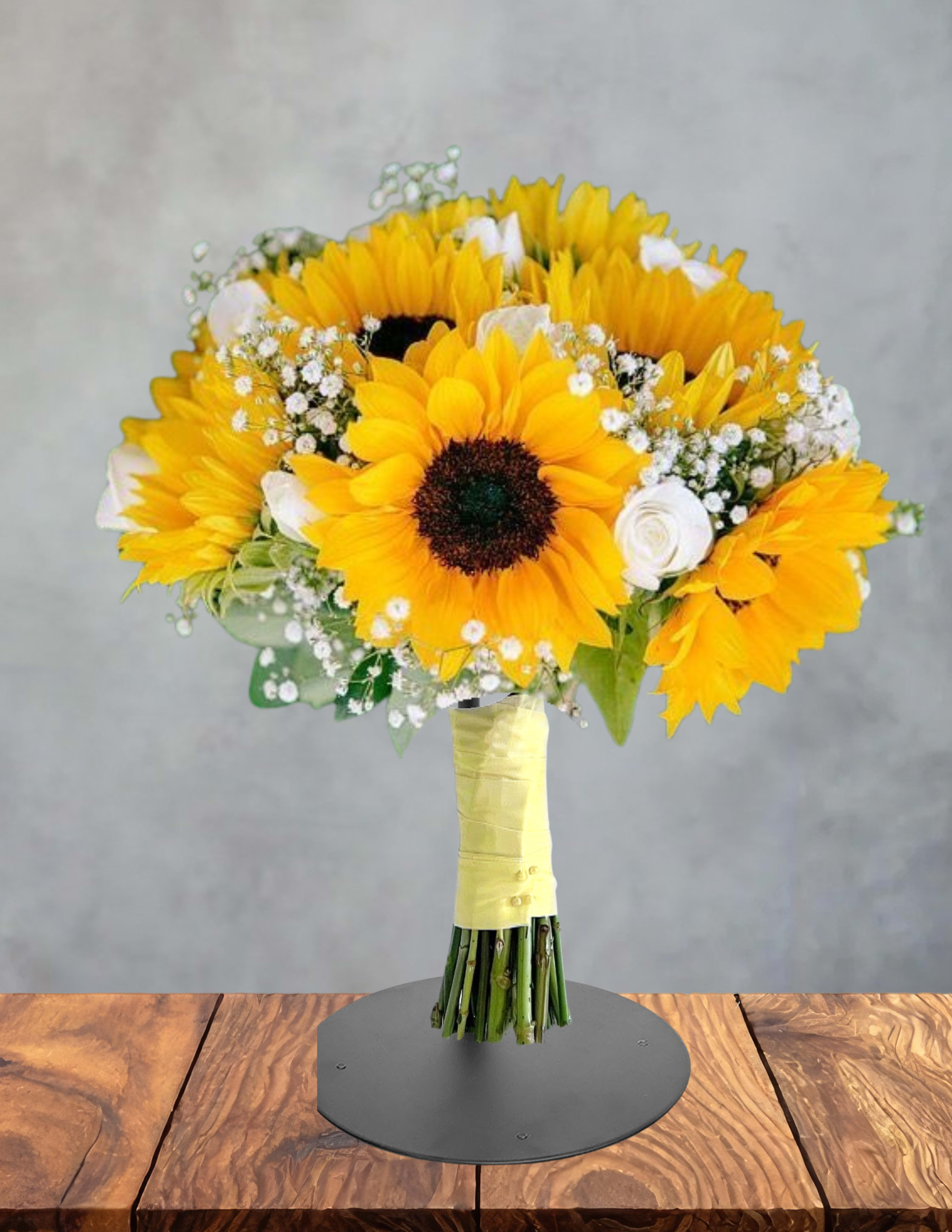 Bouquet of yellow sunflowers with white accent flowers