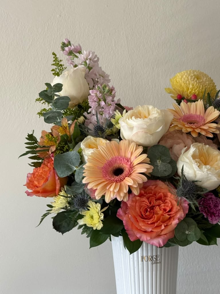 Dopamine aquarelle- Garden roses, Stock, Gerber daisy  - Colorful mix of flowers in a vas. perfect for any occasion. 