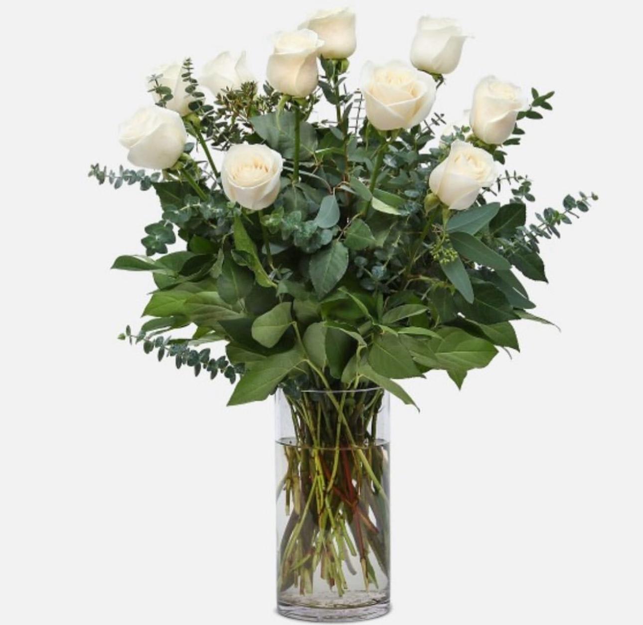 dozen white in a vase with eucalyptus  - dozen white in a vase with eucalyptus 