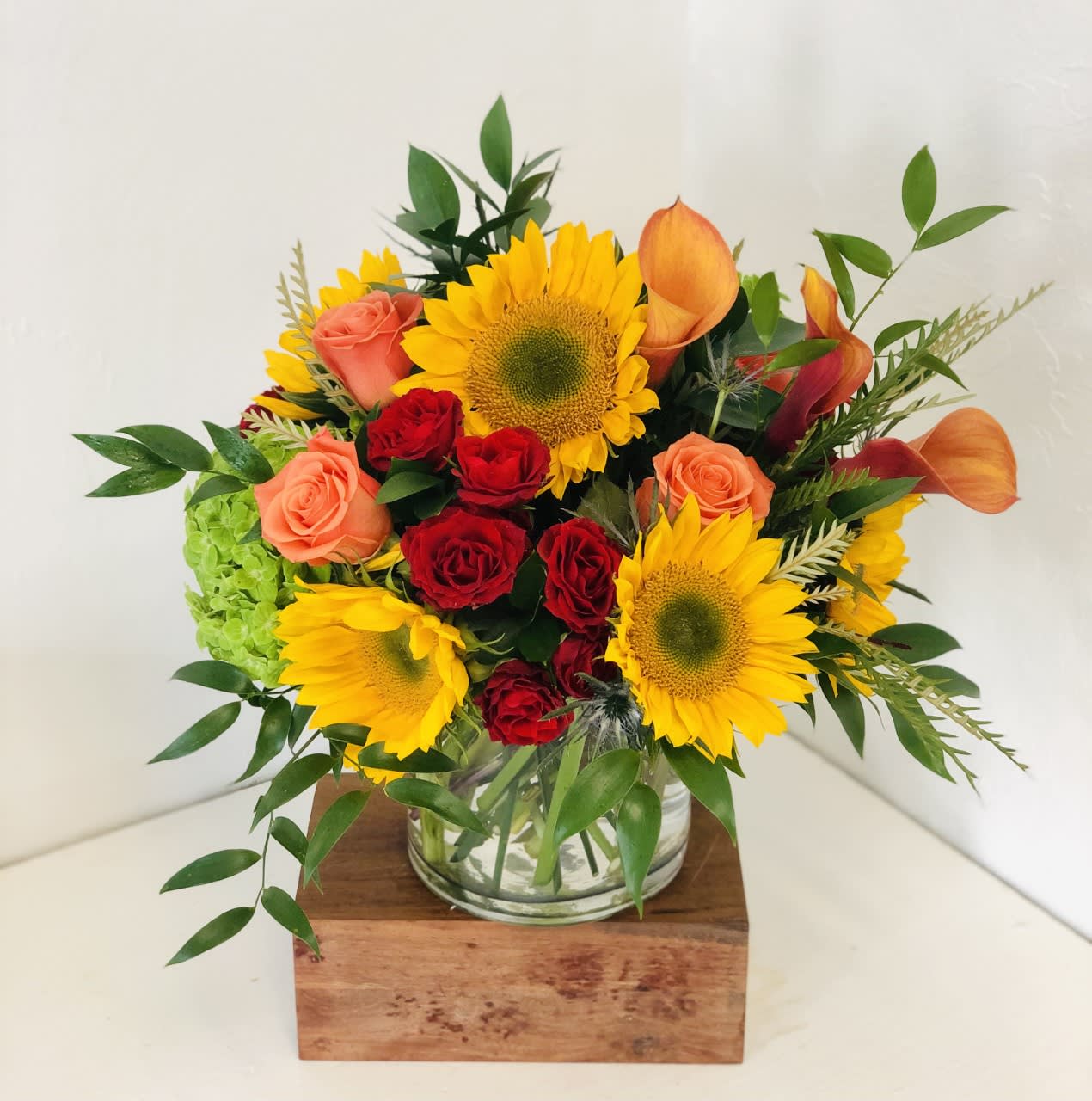 Autumn Woods  - This floral design evokes a fall feeling, but with all of the Florida vibes.