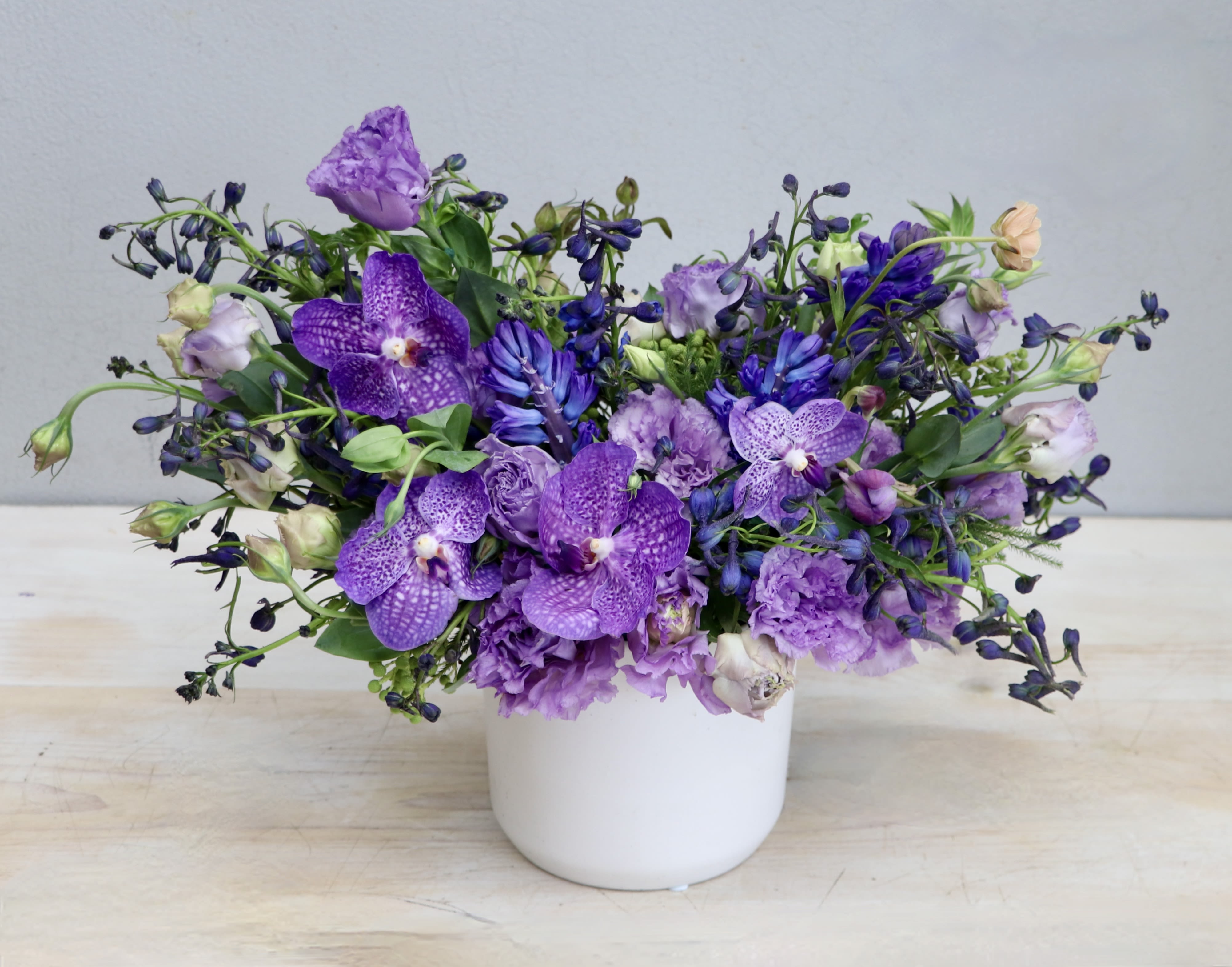 Purple Hues - My Glendale Florist  - Lisianthus is a delicate, pastel-colored flower known for its romantic appearance and long-lasting bloom as a cut flower.