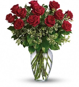 Bouquet of red roses in a clear glass vase