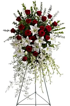 Lily and Rose Tribute Spray - Make a statement of enduring love and tribute with this dramatic lily and rose funeral spray, presented on an easel for ease of placement. Red roses, white lilies and cascading white orchids are elegant funeral flowers fit to honor someone truly special.