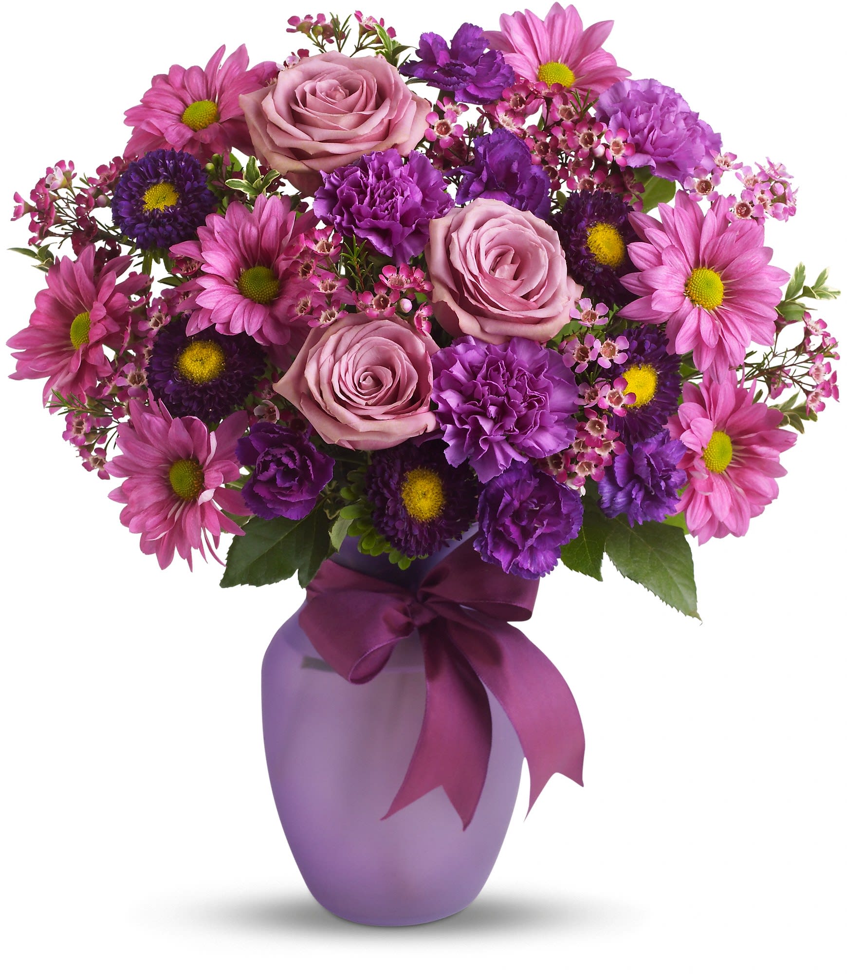 Pink and purple mixed bouquet in a lavender vase with a ribbon